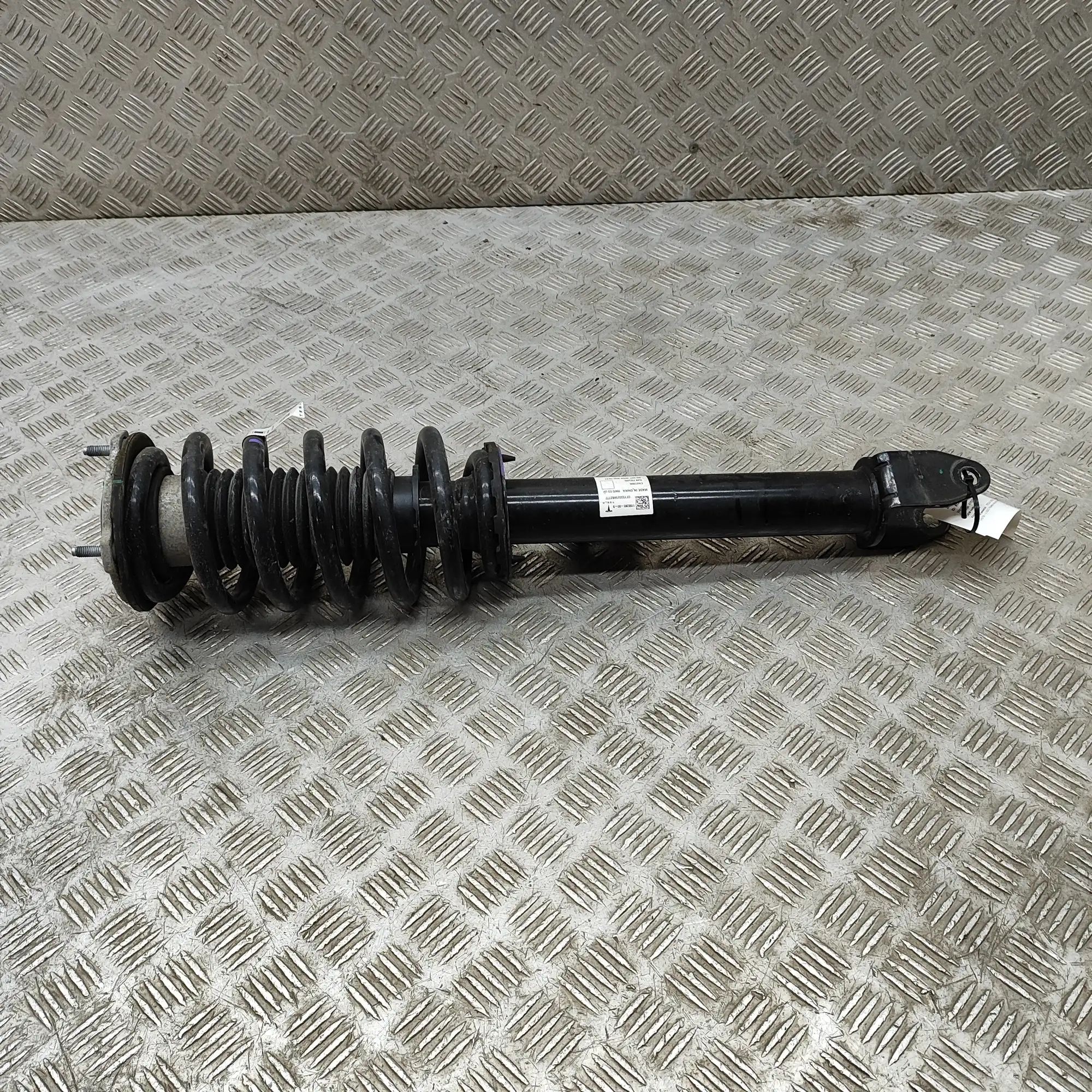Tesla Model Y Shock absorber — front left Shock absorber — front left — TESLA MODEL Y (5Y...