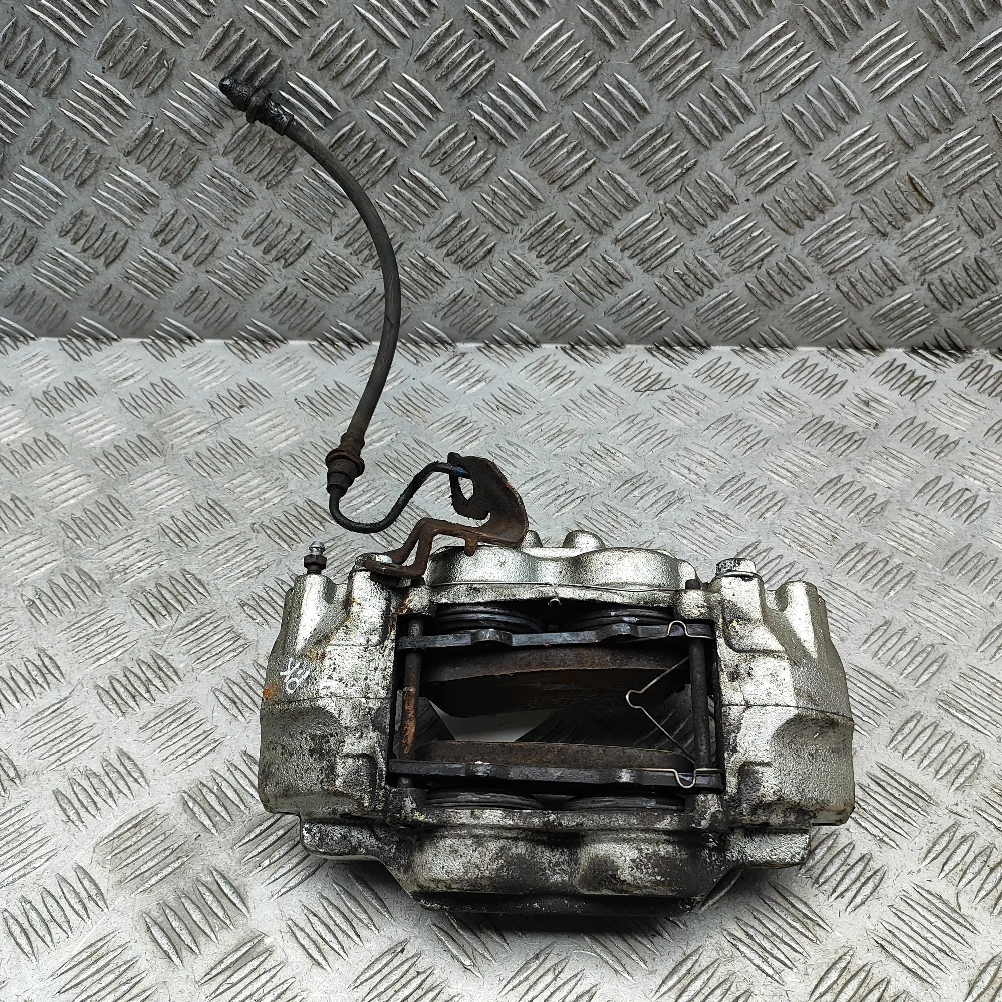 Toyota Land Cruiser 150 Front Left Brake Caliper Front left brake caliper — TOYOTA LAND CRUISER ...