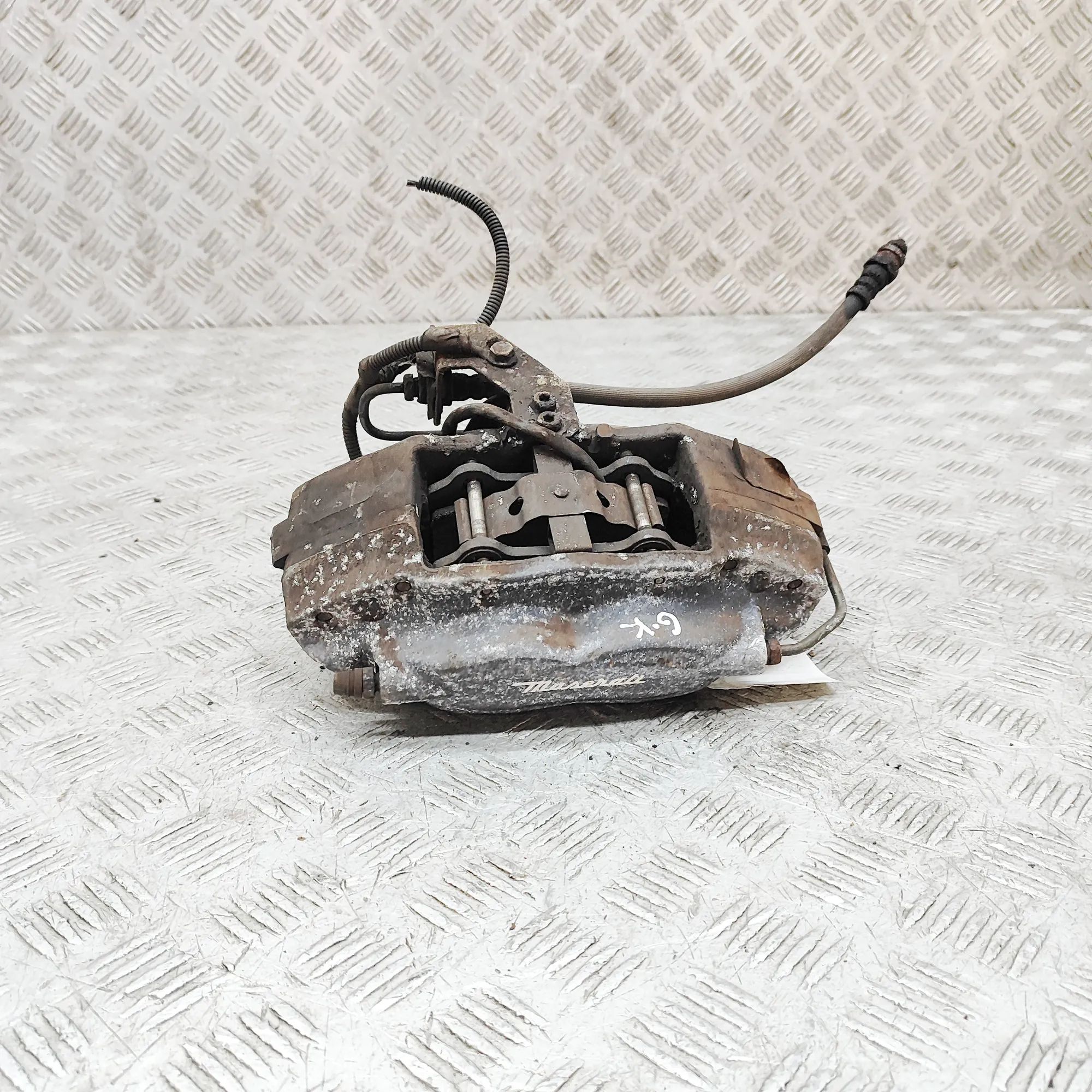 Maserati Ghibli Brake caliper — rear left Brake caliper — rear left — MASERATI GHIBLI (M1...