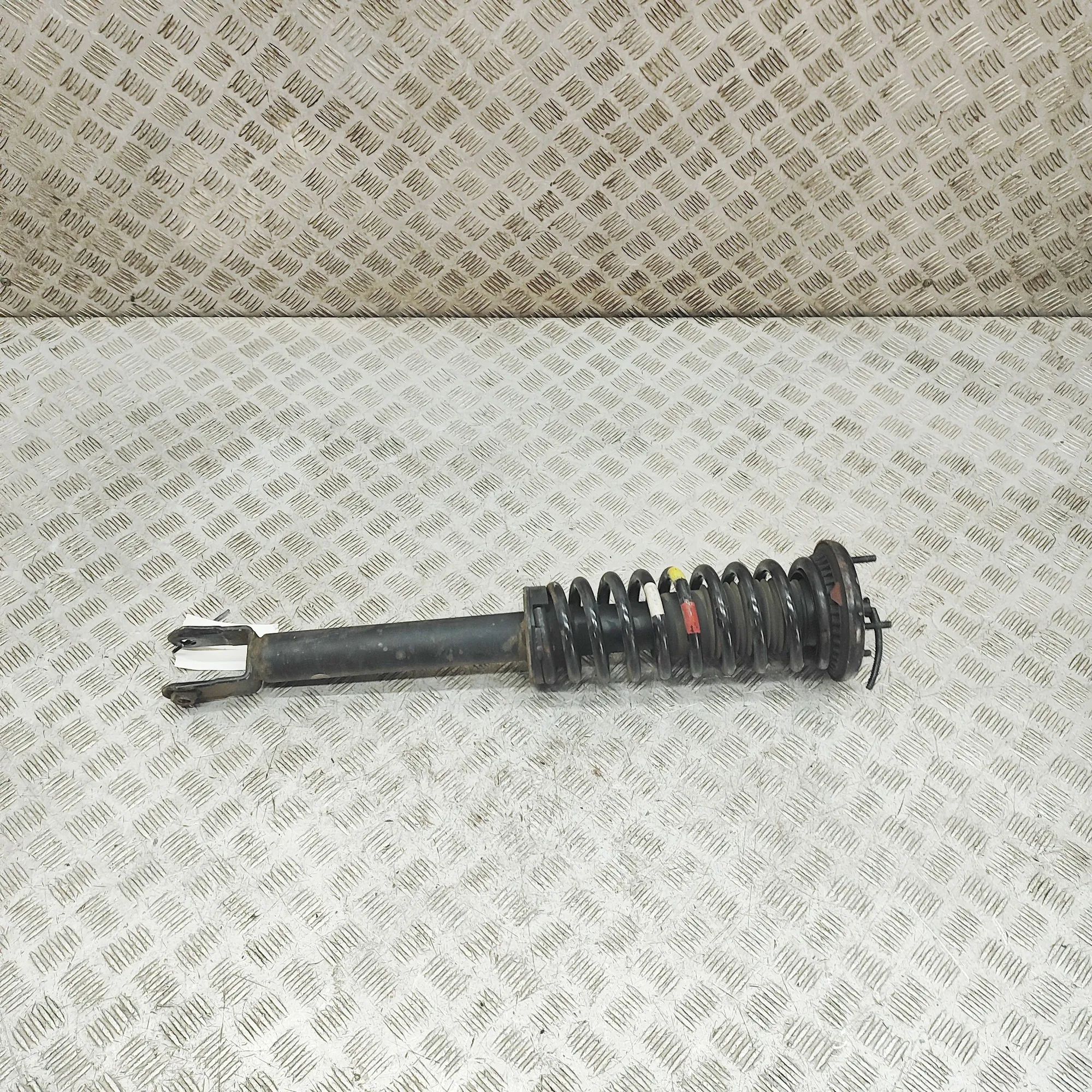 Jaguar XK Shock absorber — front left