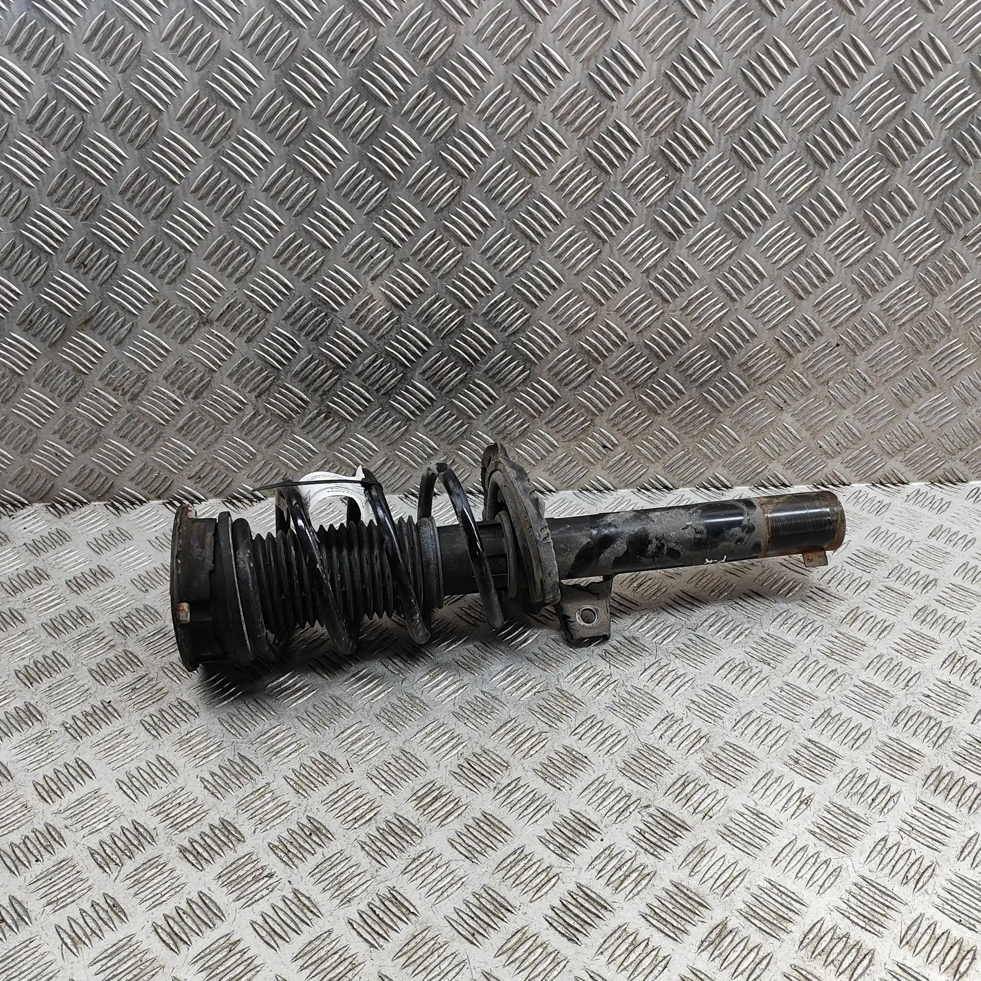 Volkswagen Caddy V Shock absorber — front left