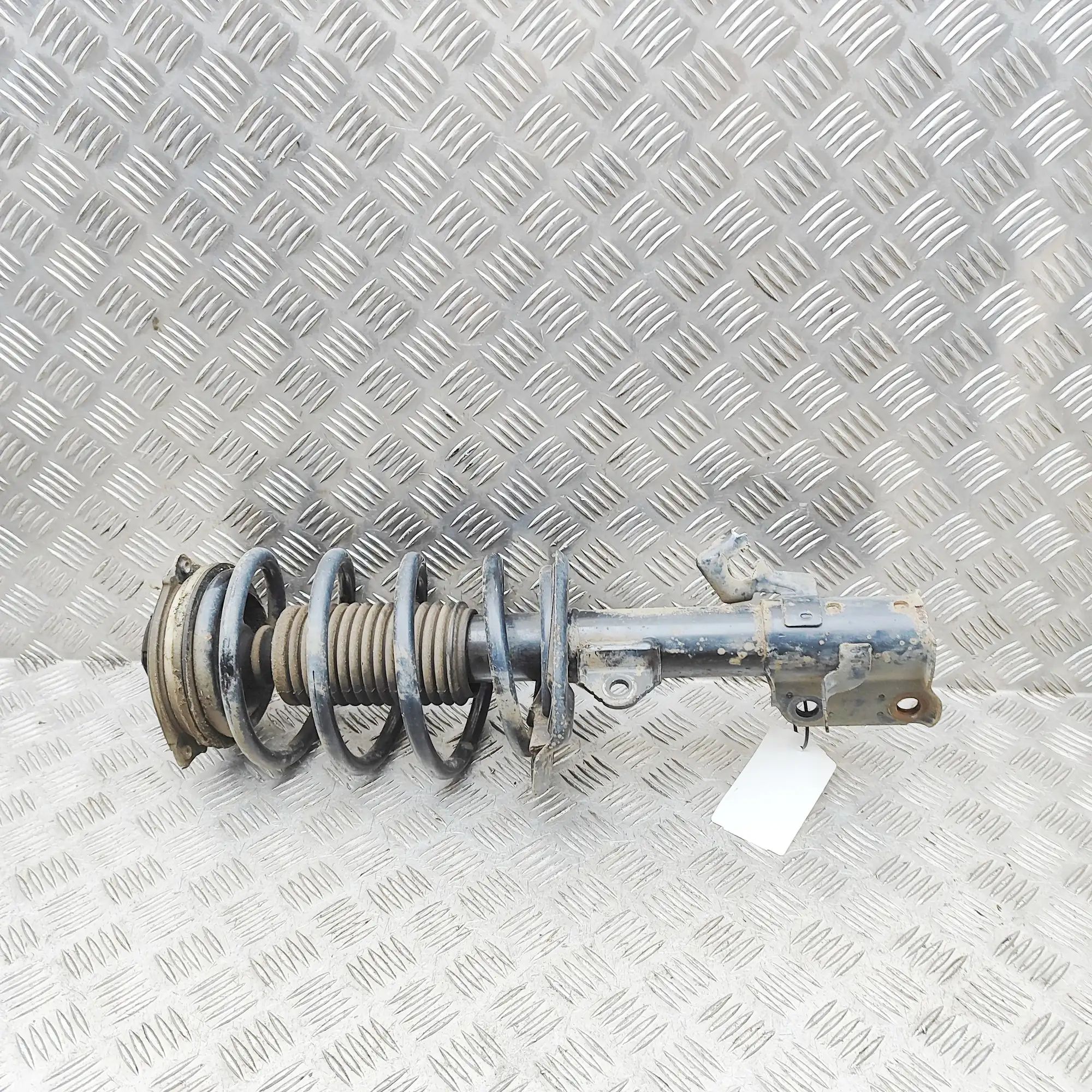 Nissan Leaf Shock absorber — front left Shock absorber — front left — NISSAN LEAF II (Z...