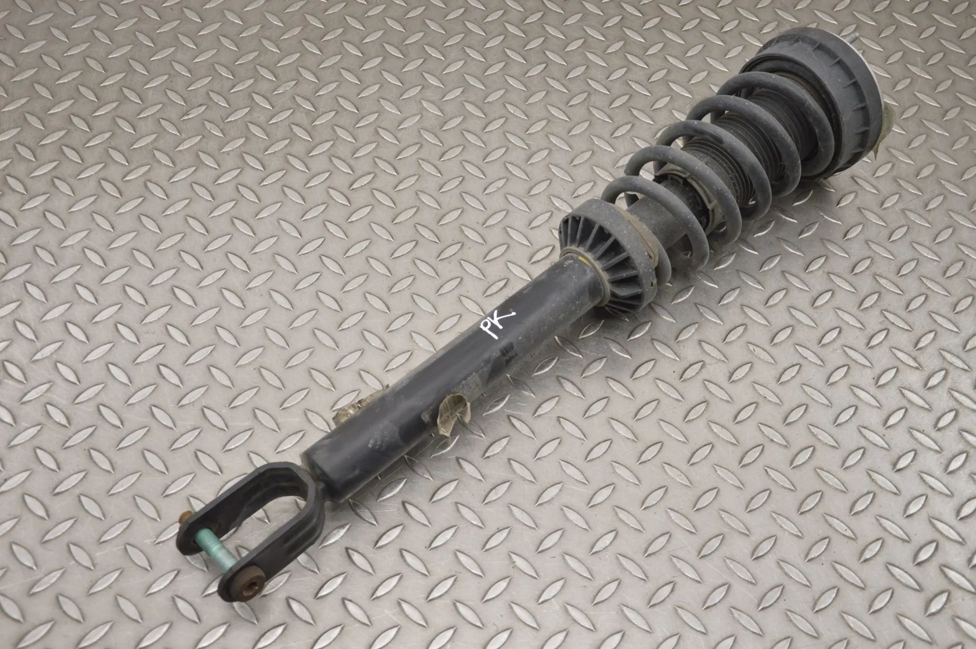 Jaguar XF Shock absorber — front left