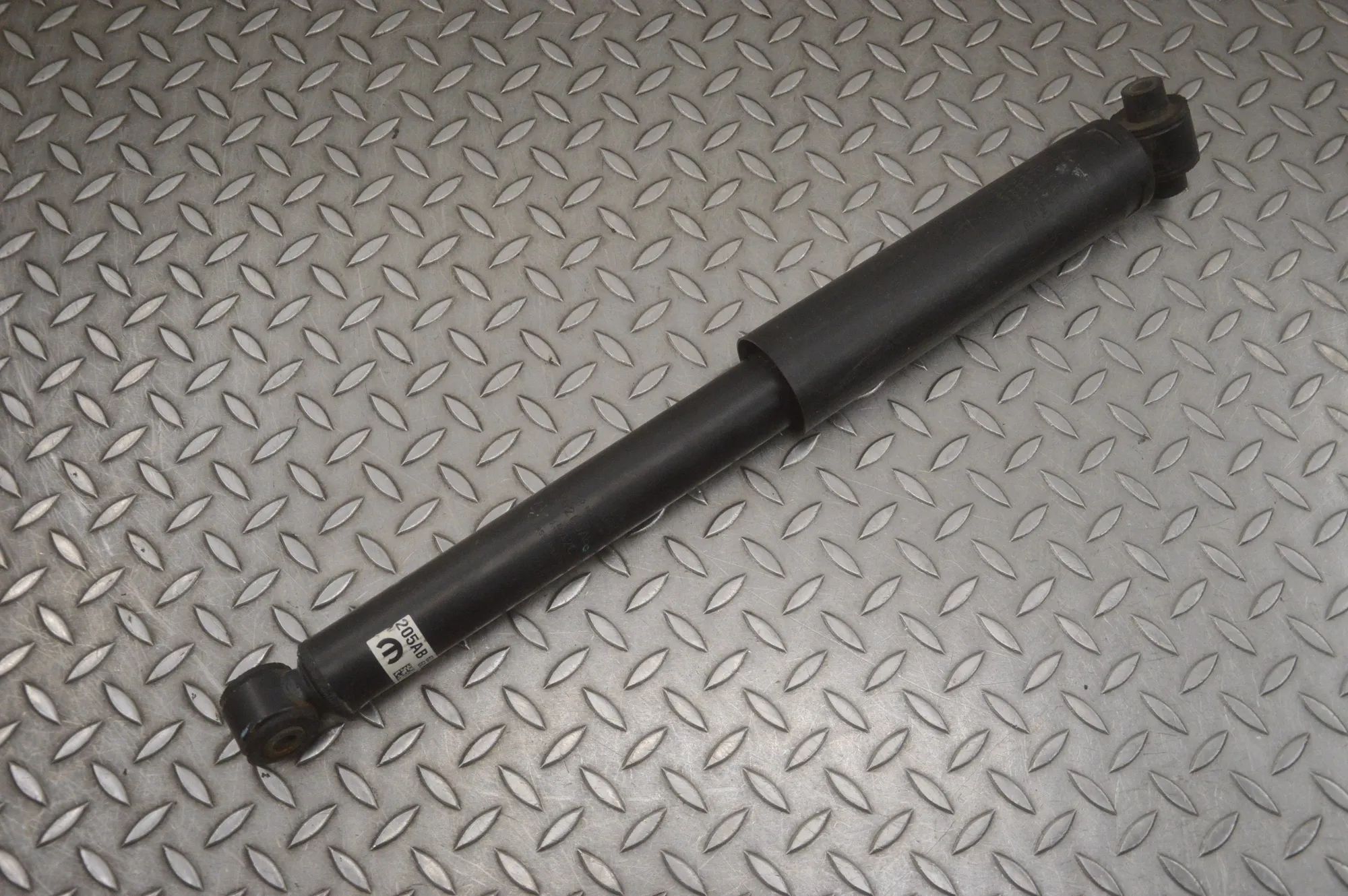 Jeep Wrangler (JL) Rear Left Shock Absorber Rear Left Shock Absorber — JEEP WRANGLER IV JL ...