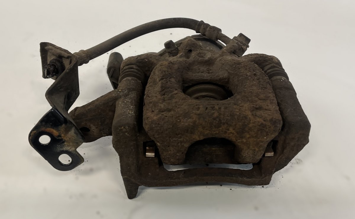 Nissan Qashqai (J11) Brake caliper — rear left Brake caliper — rear left — NISSAN QASHQAI II (...
