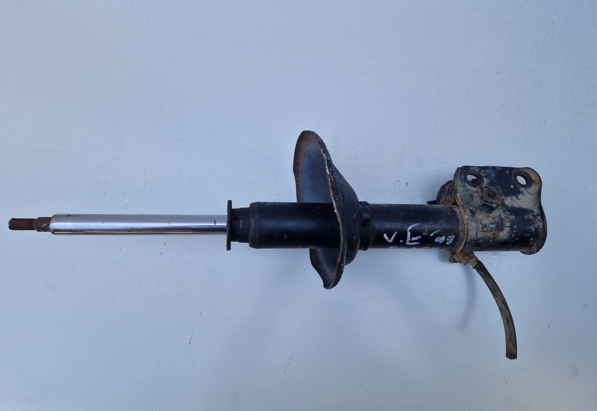 Subaru Legacy Shock absorber — front left