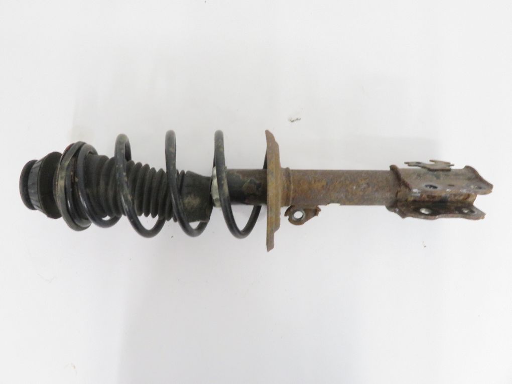 Toyota Yaris Shock absorber — front left