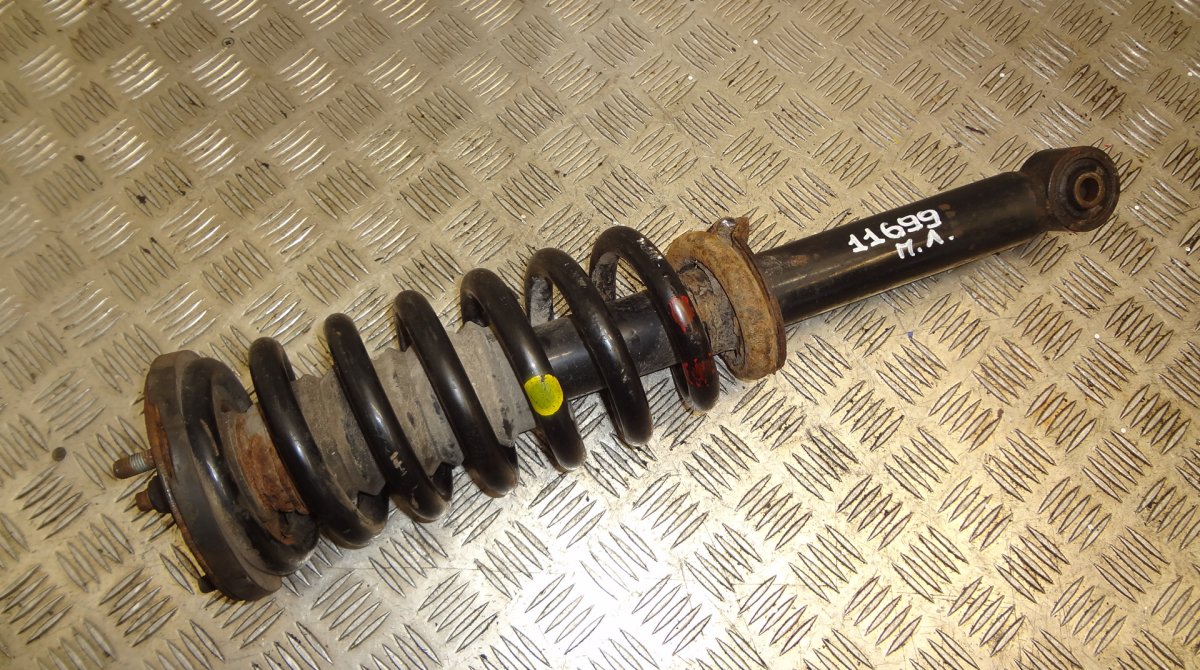 Kia Sorento Shock absorber — front left