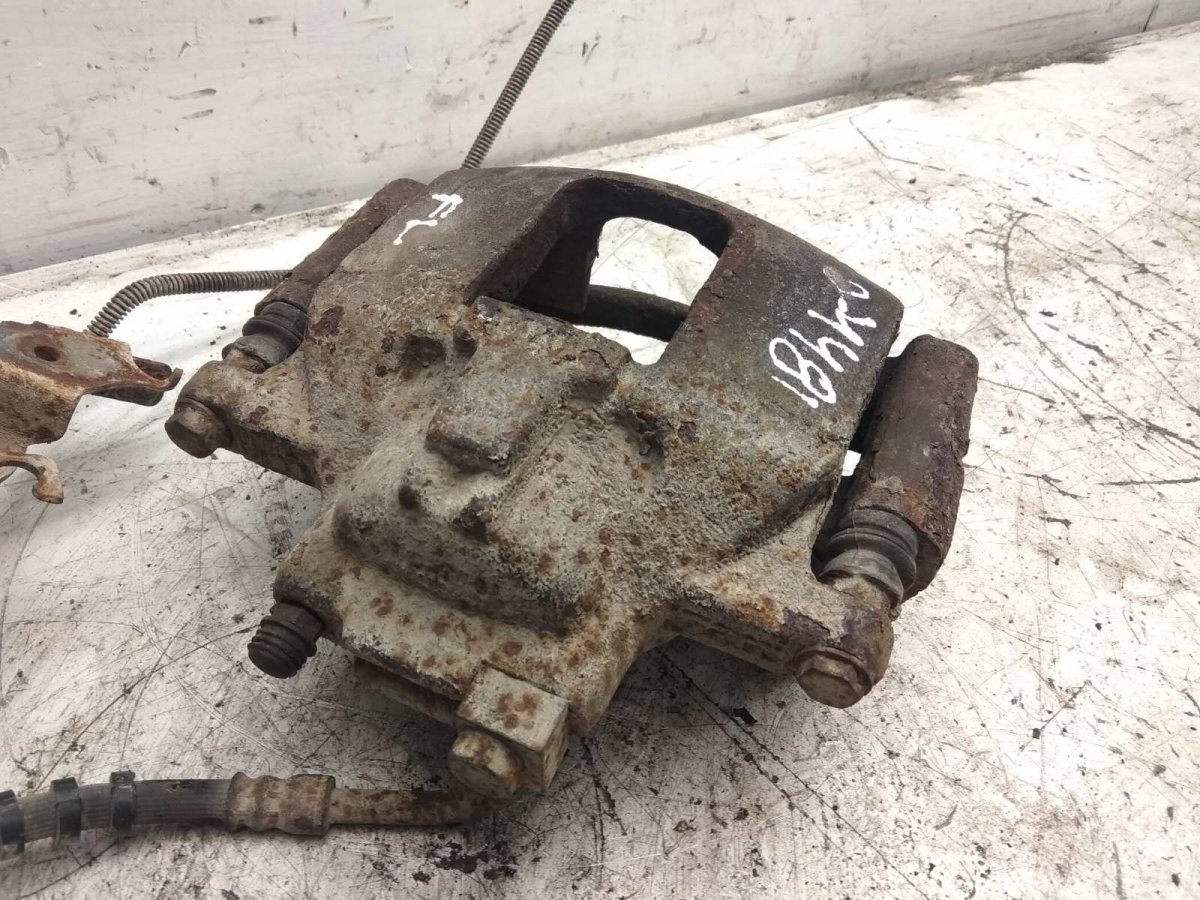 Chrysler Grand Voyager / Town & Country Brake caliper — front left Brake caliper — front left — CHRYSLER VOYAGER V...