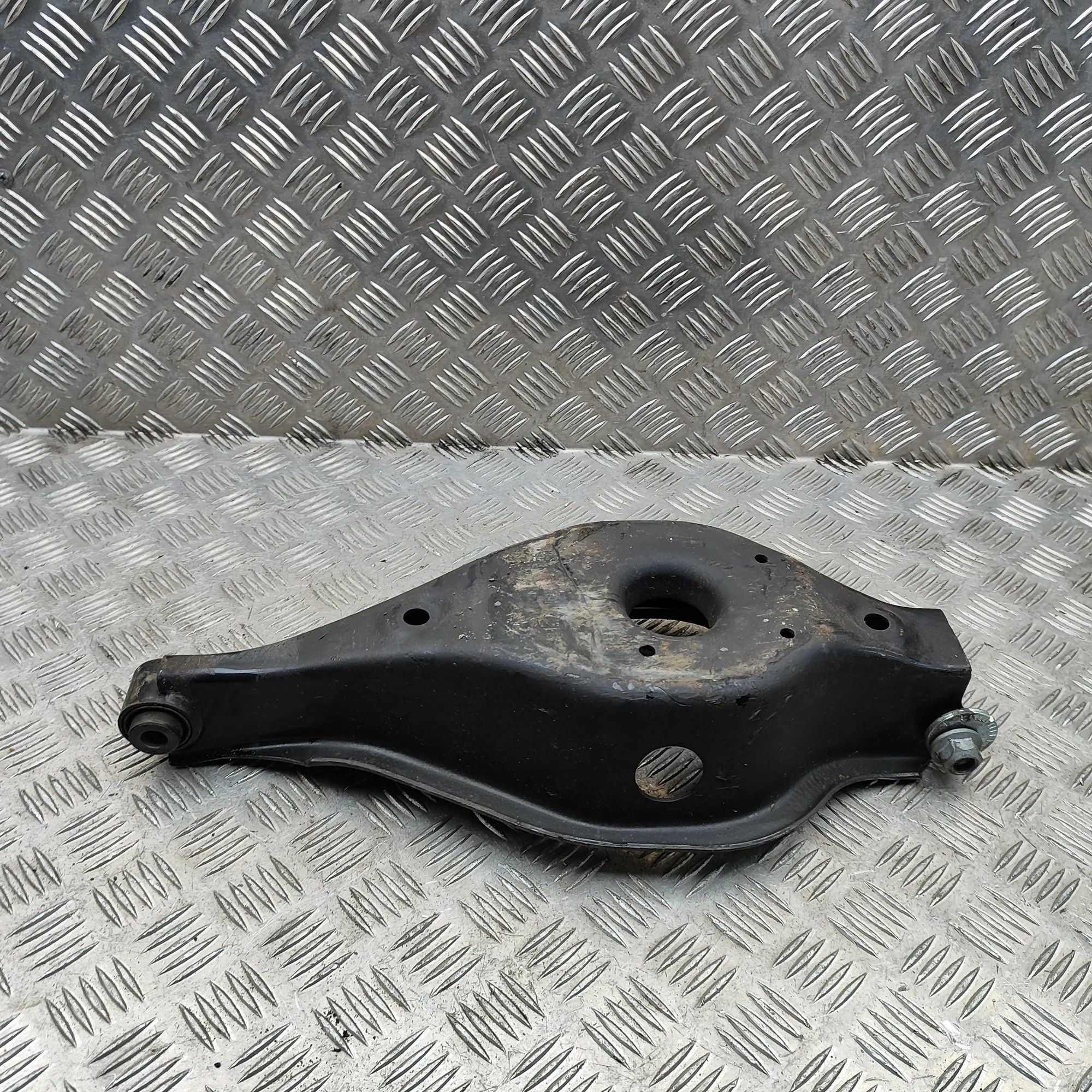 Nissan Ariya Rear Left Lower Control Arm Rear Left Lower Control Arm — NISSAN ARIYA (FE0...