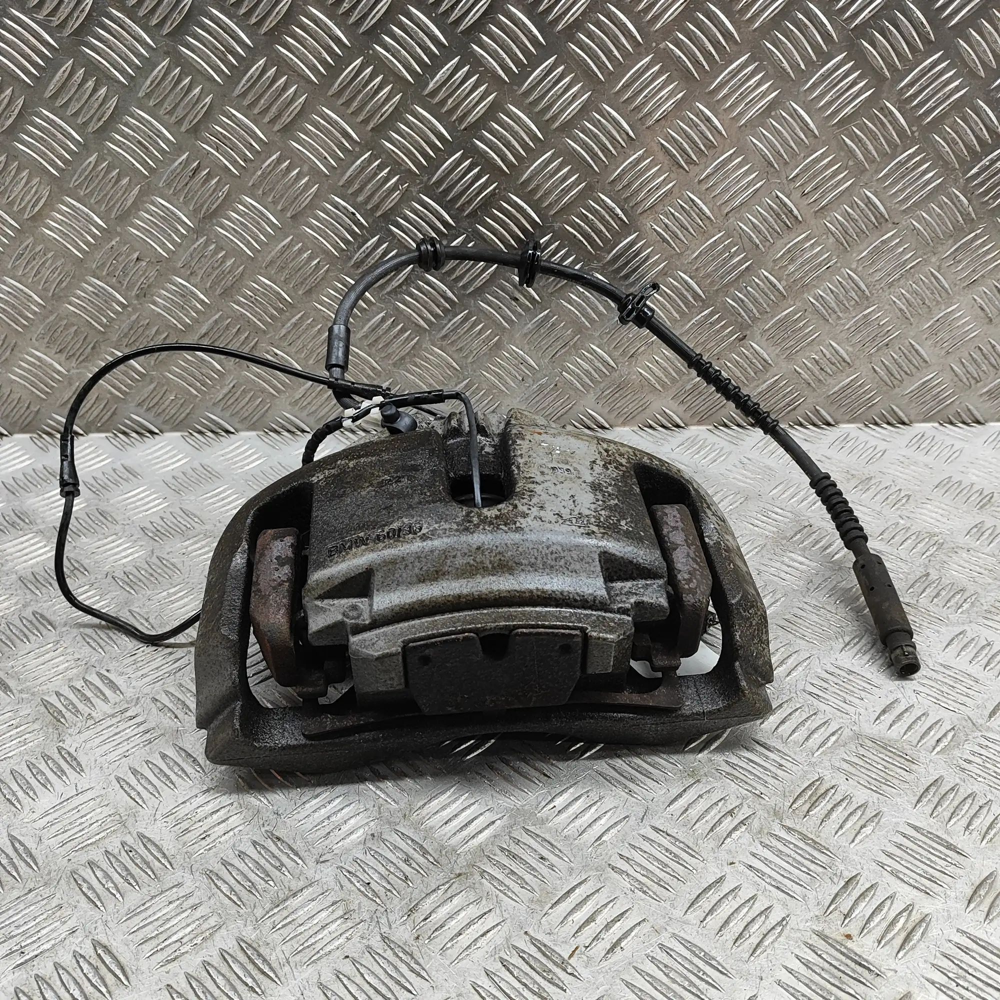 BMW 7 (F01 / F02 / F03 / F04) Front Left Brake Caliper Front left brake caliper — BMW 7 F01, F02 (2008...