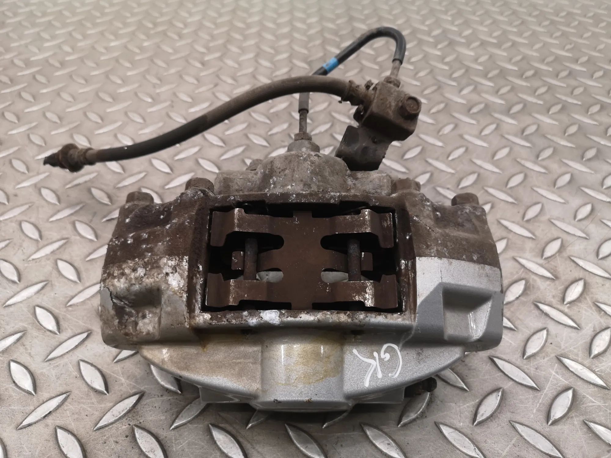 Infiniti Q50 Brake caliper — rear left Brake caliper — rear left — INFINITI Q50 (2013-...