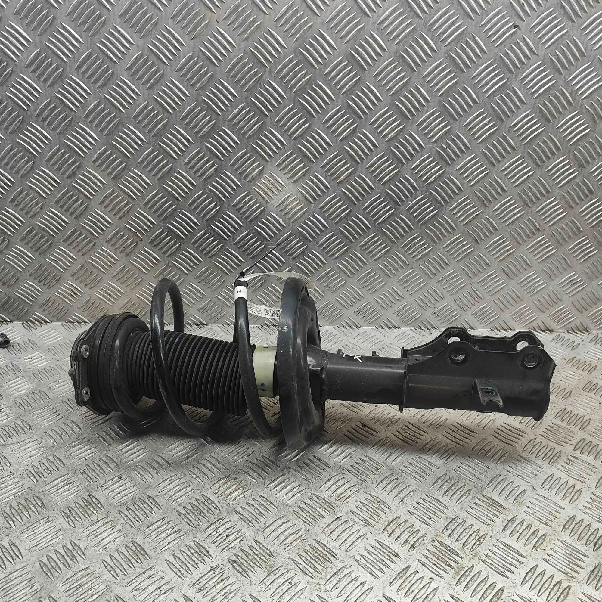 Chevrolet Malibu Shock absorber — front left