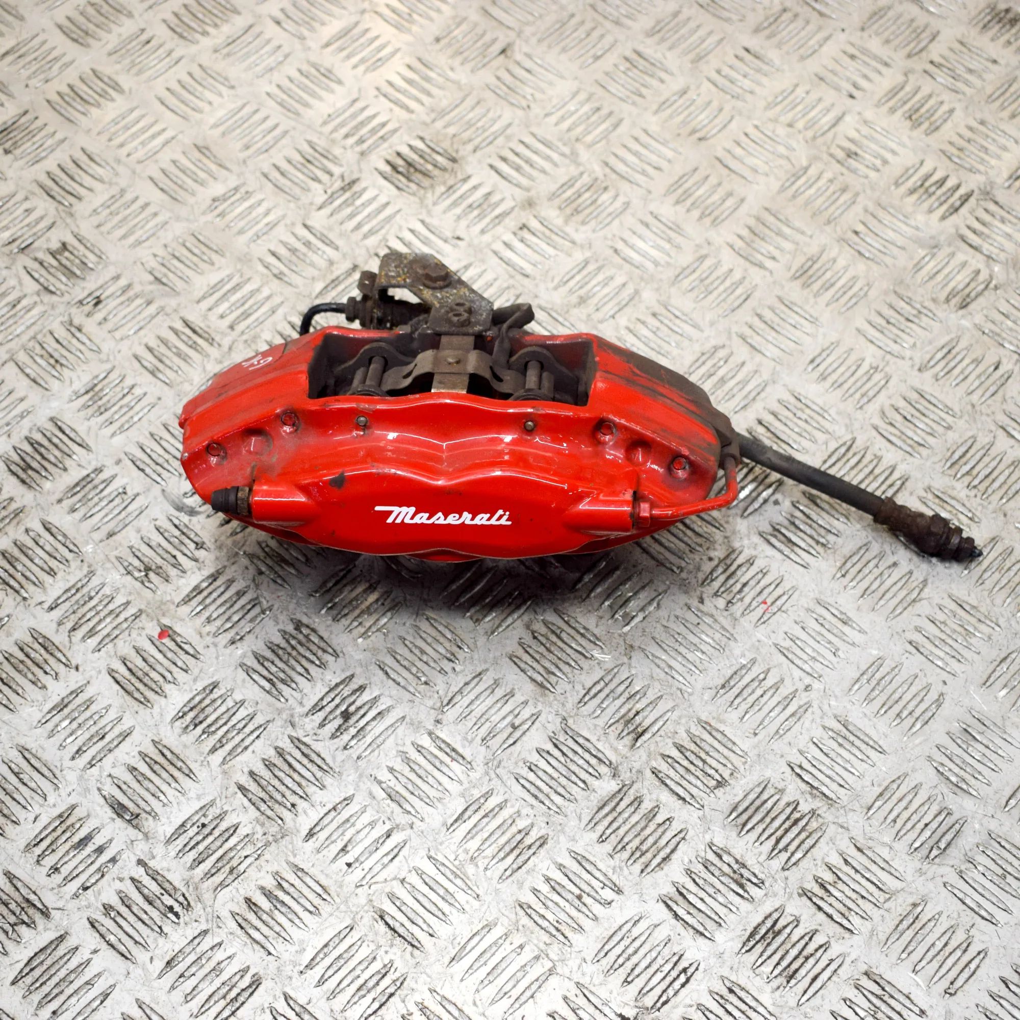 Maserati Ghibli Brake caliper — rear left Brake caliper — rear left — MASERATI GHIBLI (M1...