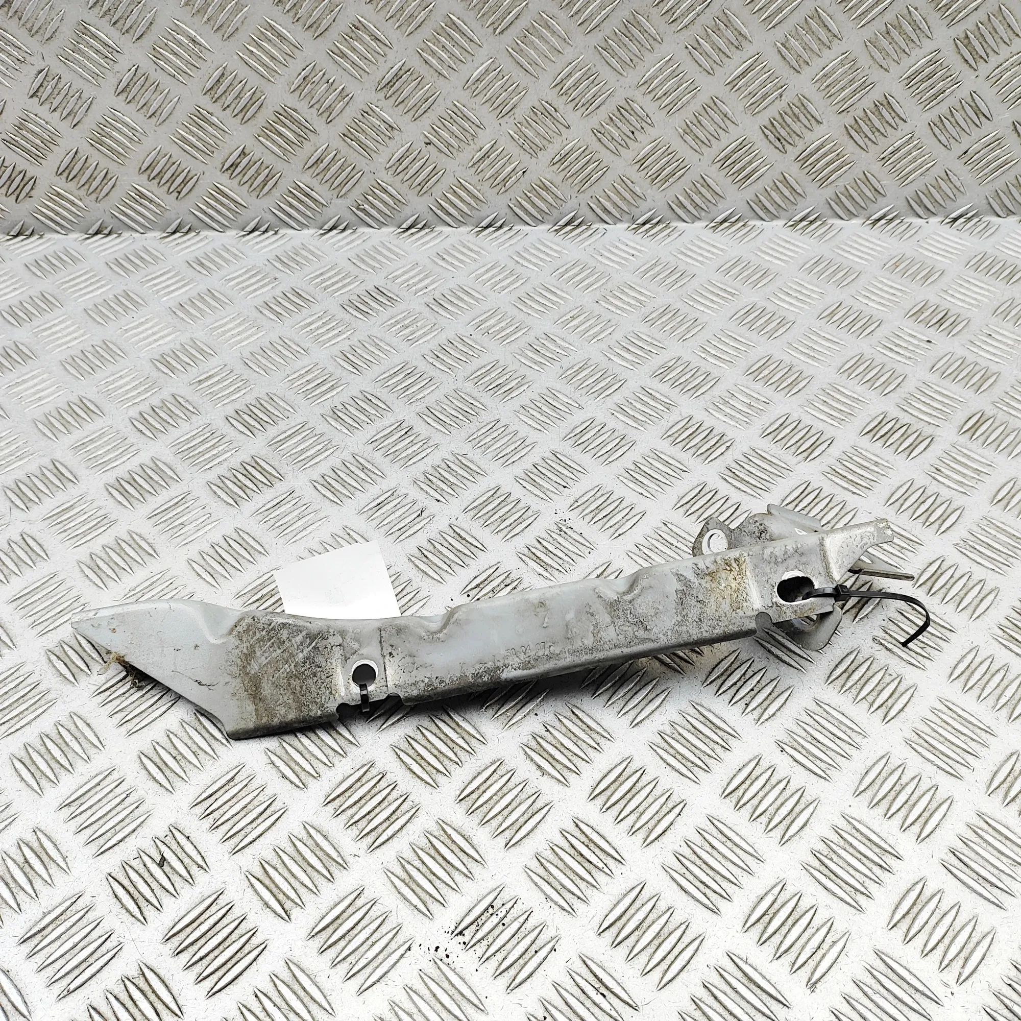 Jaguar XK Fender bracket — front right