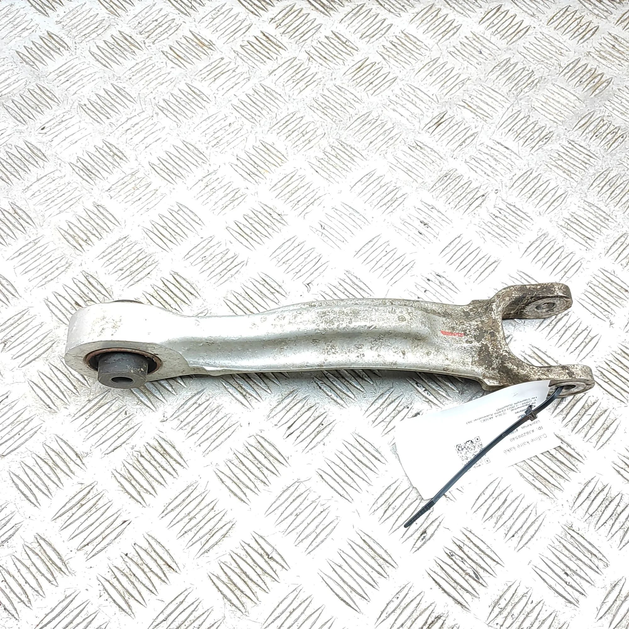 Tesla Model Y Control arm — rear left