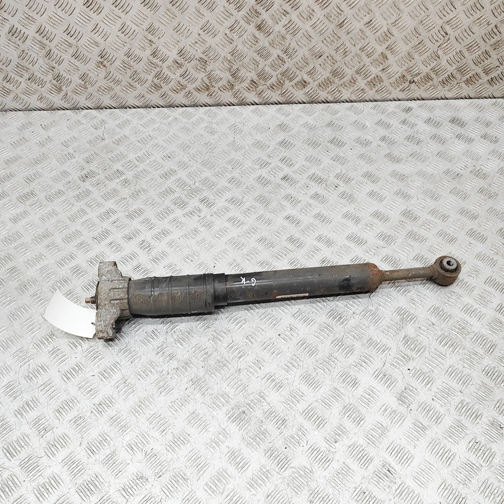 Maserati Ghibli Shock absorber — rear left Shock absorber — rear left — MASERATI GHIBLI (M...