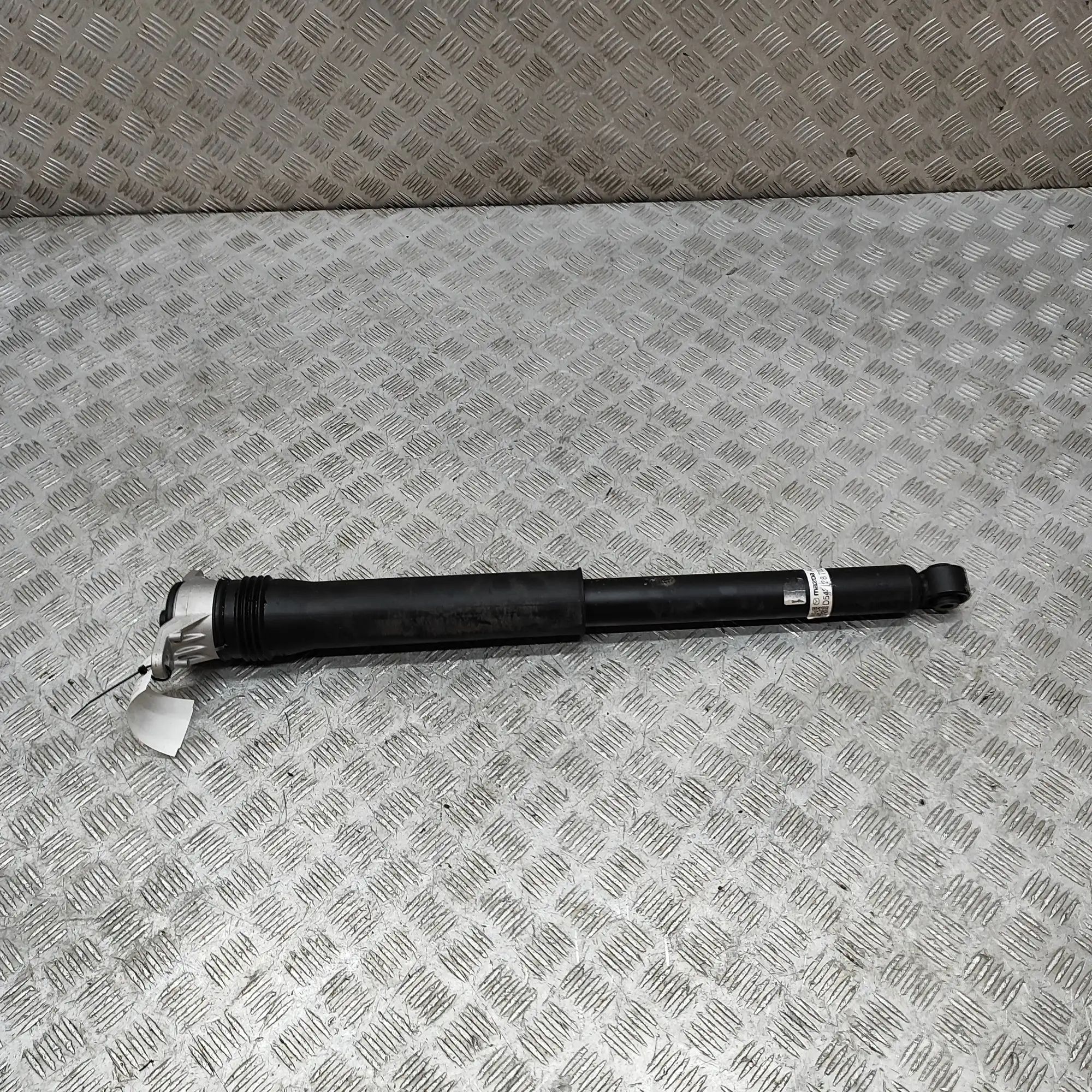Mazda 3 (BP) Shock absorber — rear left Shock absorber — rear left — MAZDA CX-3 (0 DM) ...