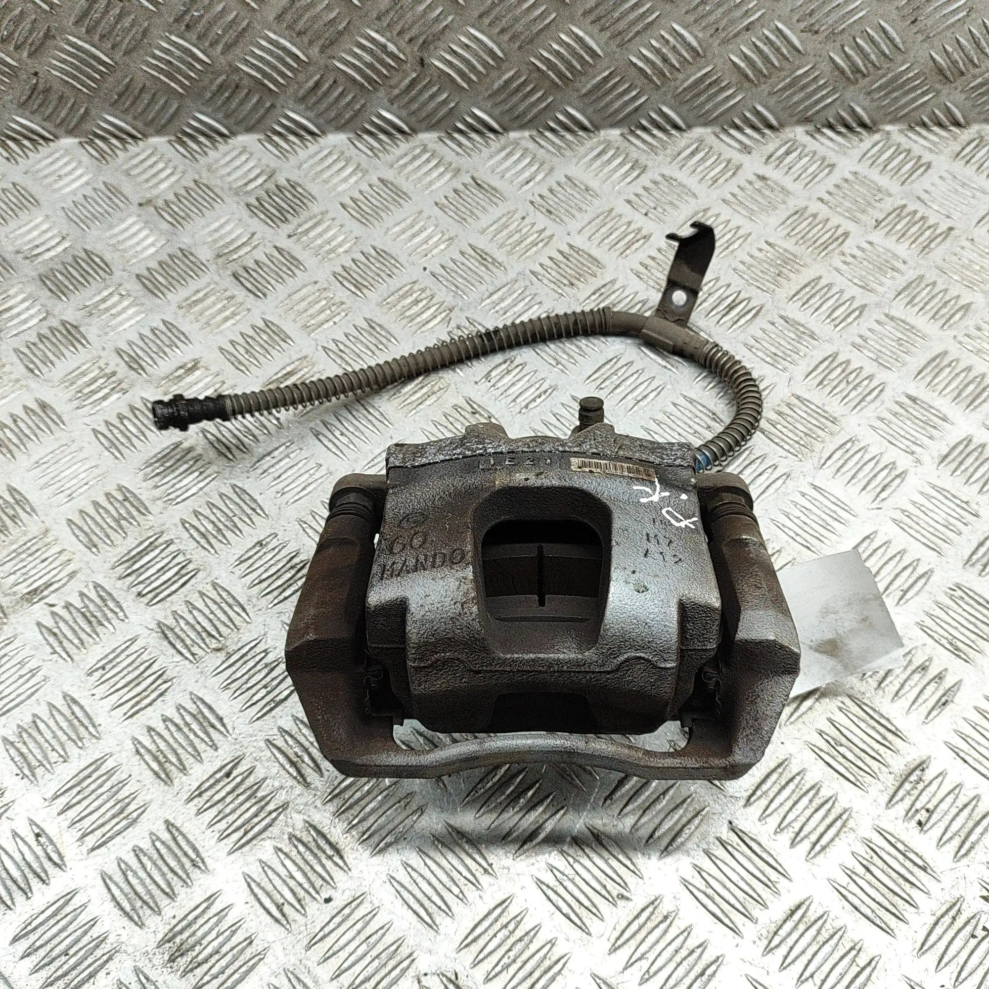 Ssangyong Korando Brake caliper — front left Brake caliper — front left — SSANGYONG KORANDO ...