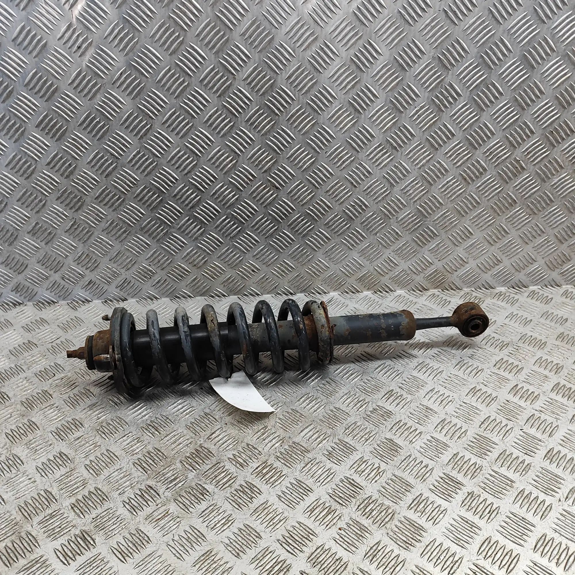 Toyota Hilux Shock absorber — front left Shock absorber — front left — TOYOTA HILUX (VII...