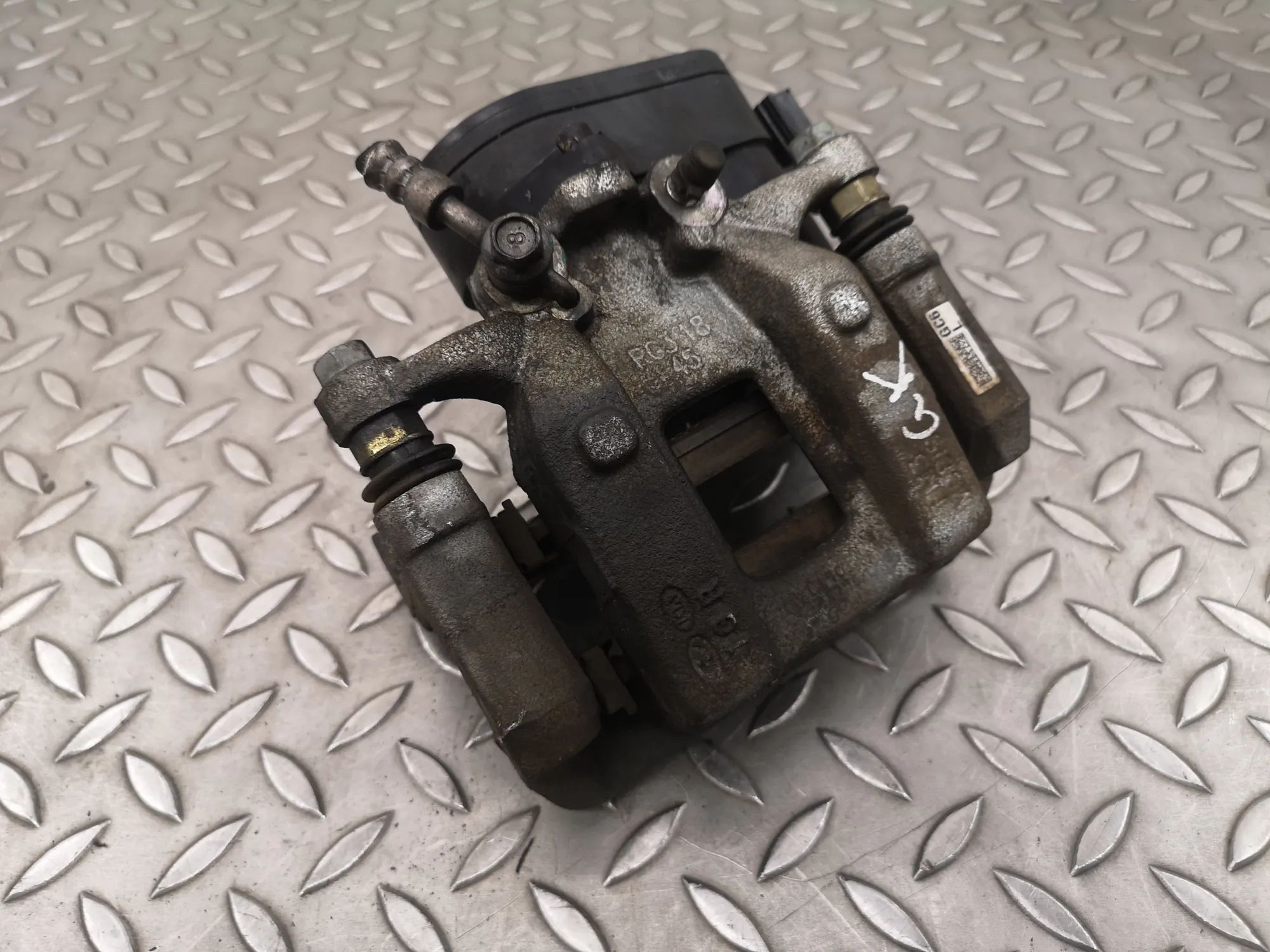 Hyundai Ioniq 5 Brake caliper — rear left Brake caliper — rear left — HYUNDAI IONIQ (5 NE...