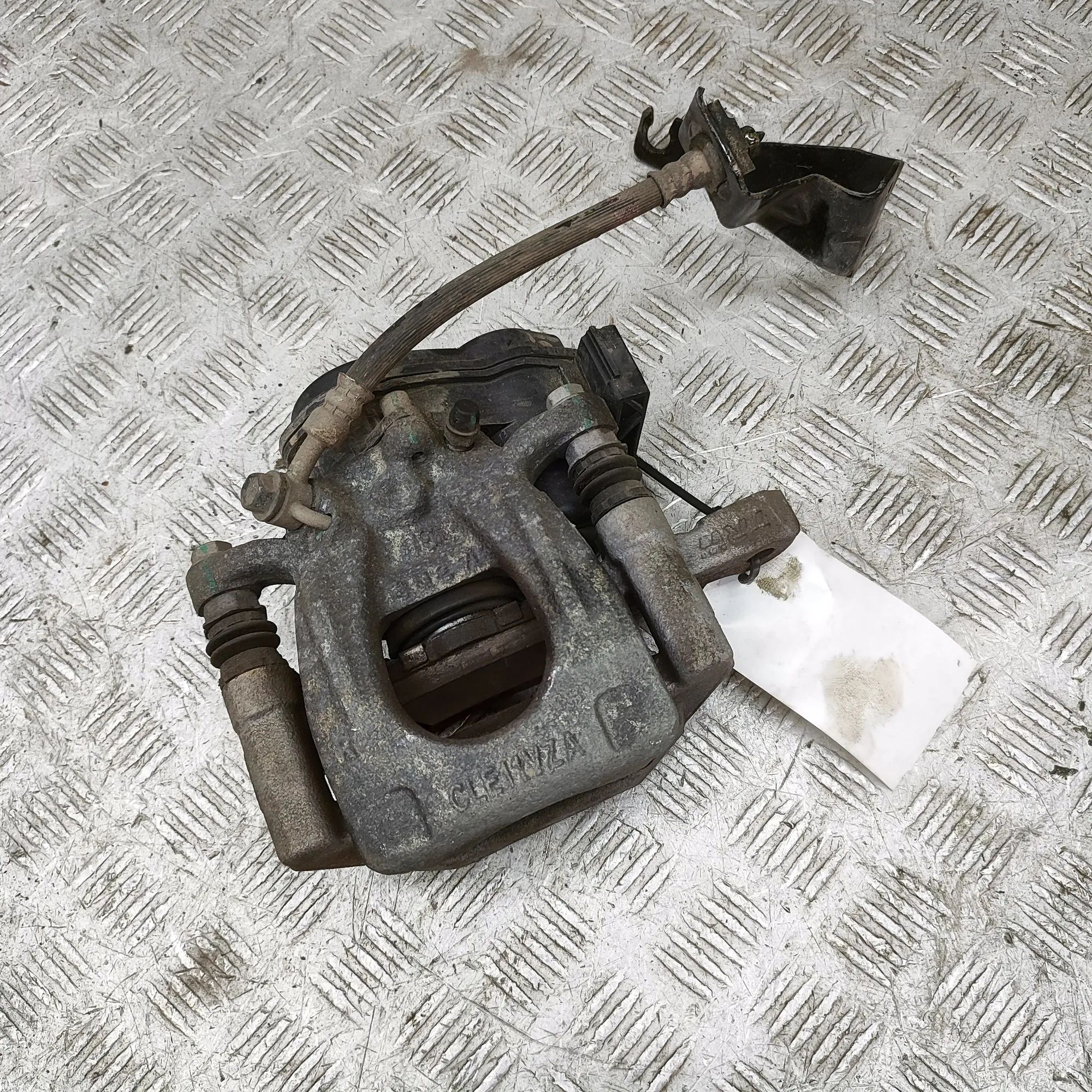Nissan Leaf Brake caliper — rear right Brake caliper — rear right — NISSAN LEAF (ZE1) ...