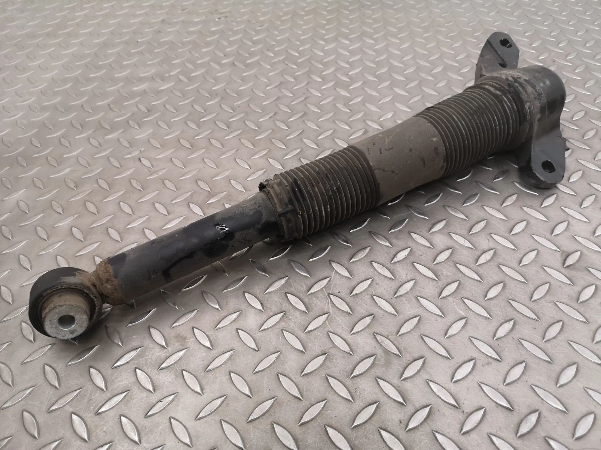 Jaguar E-Pace Shock absorber — rear left