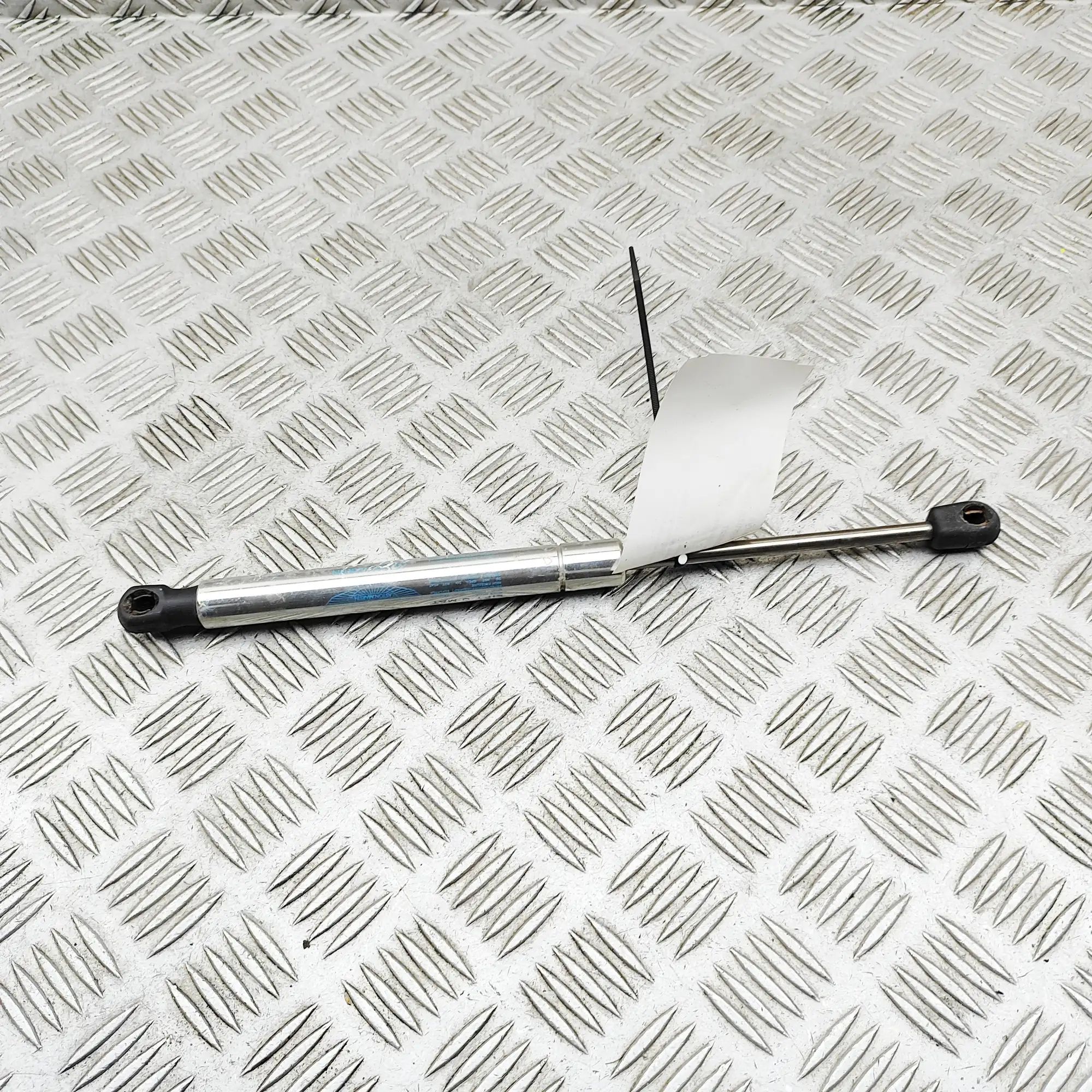 Bonnet gas strut — front left
