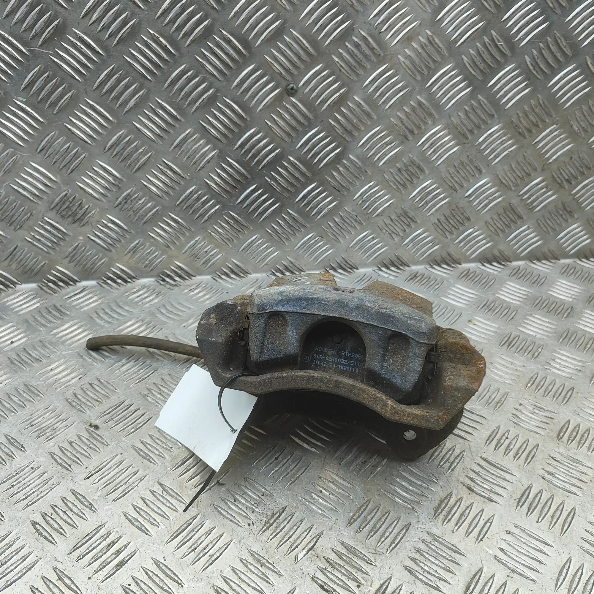 Hyundai Tucson Brake caliper — front right Brake caliper — front right — HYUNDAI TUCSON (T...