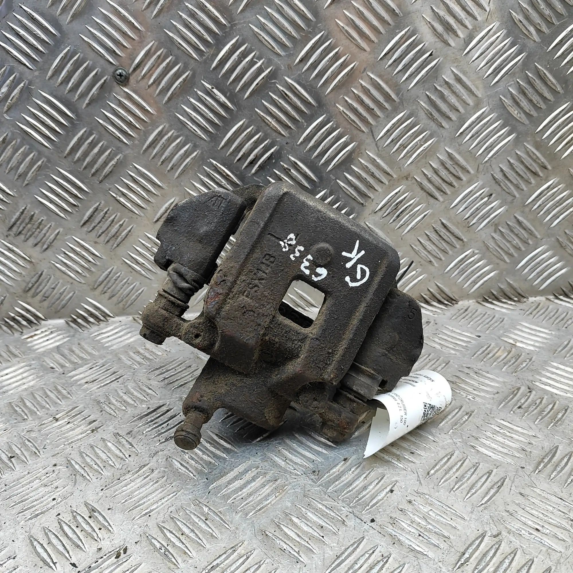 Toyota Land Cruiser 100 Brake caliper — rear left Brake caliper — rear left — TOYOTA LAND CRUISER...