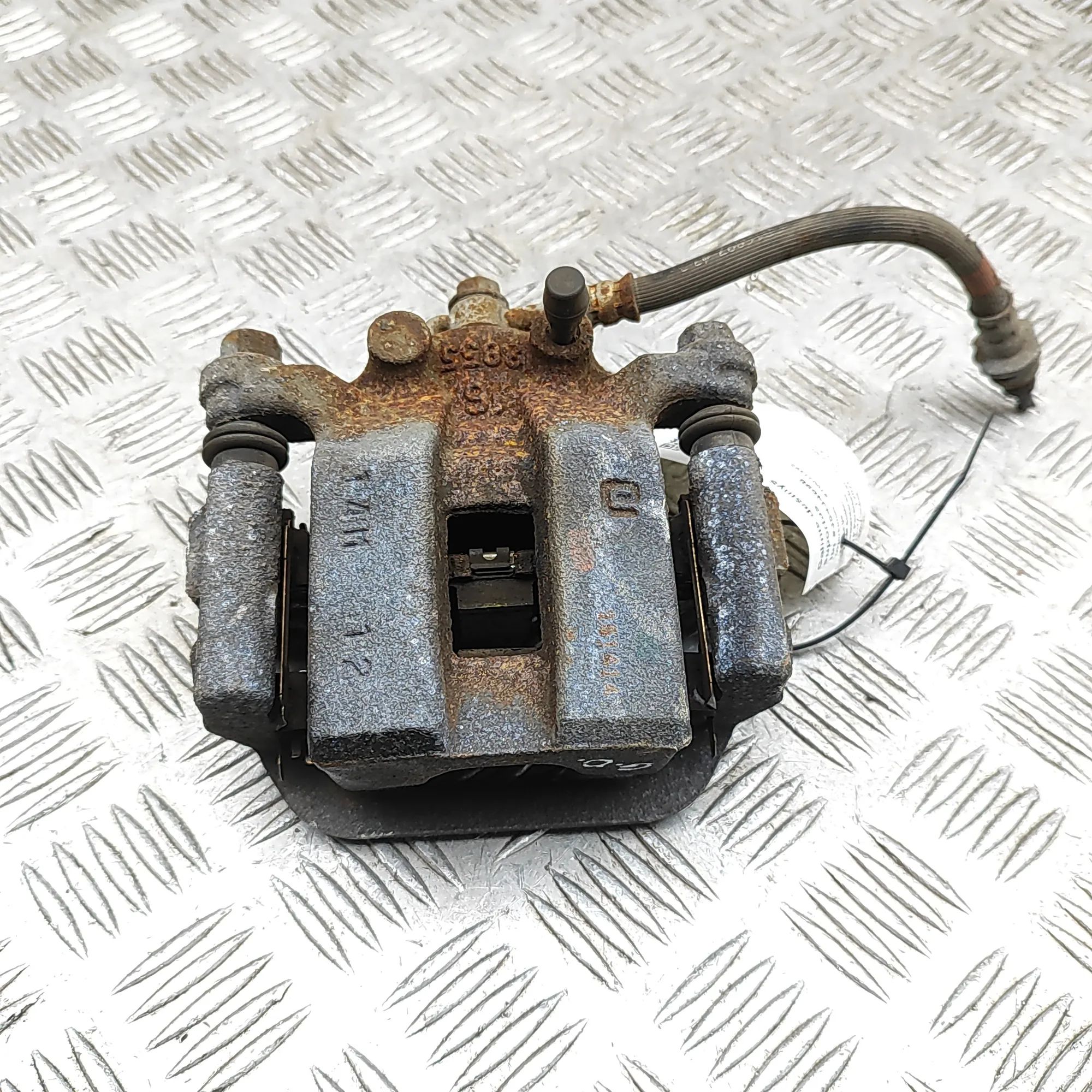 Nissan Leaf Brake caliper — rear right Brake caliper — rear right — NISSAN LEAF (ZE1) ...