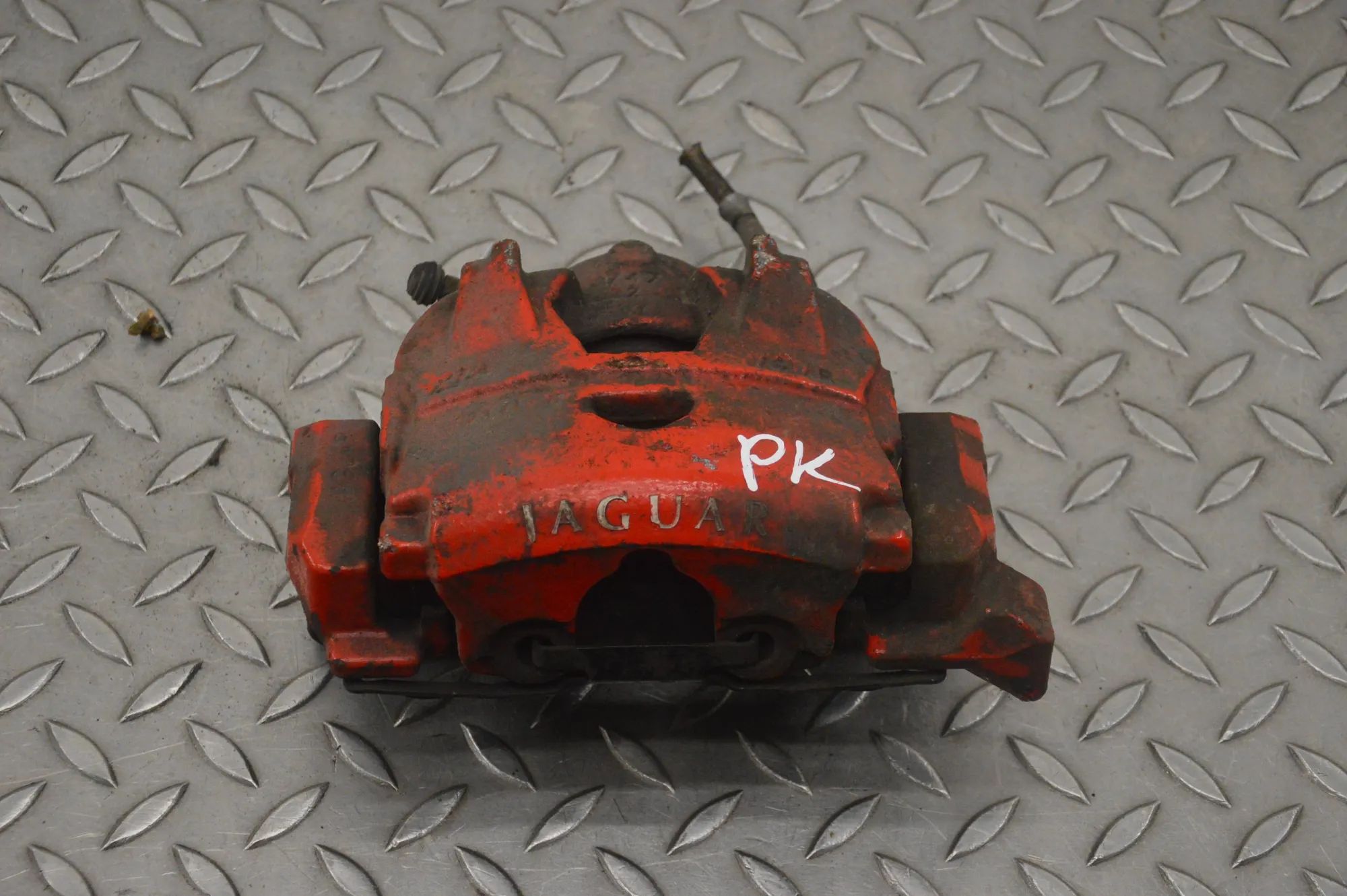 Jaguar XK Brake caliper — front left Brake caliper — front left — JAGUAR XK (Coupe X...