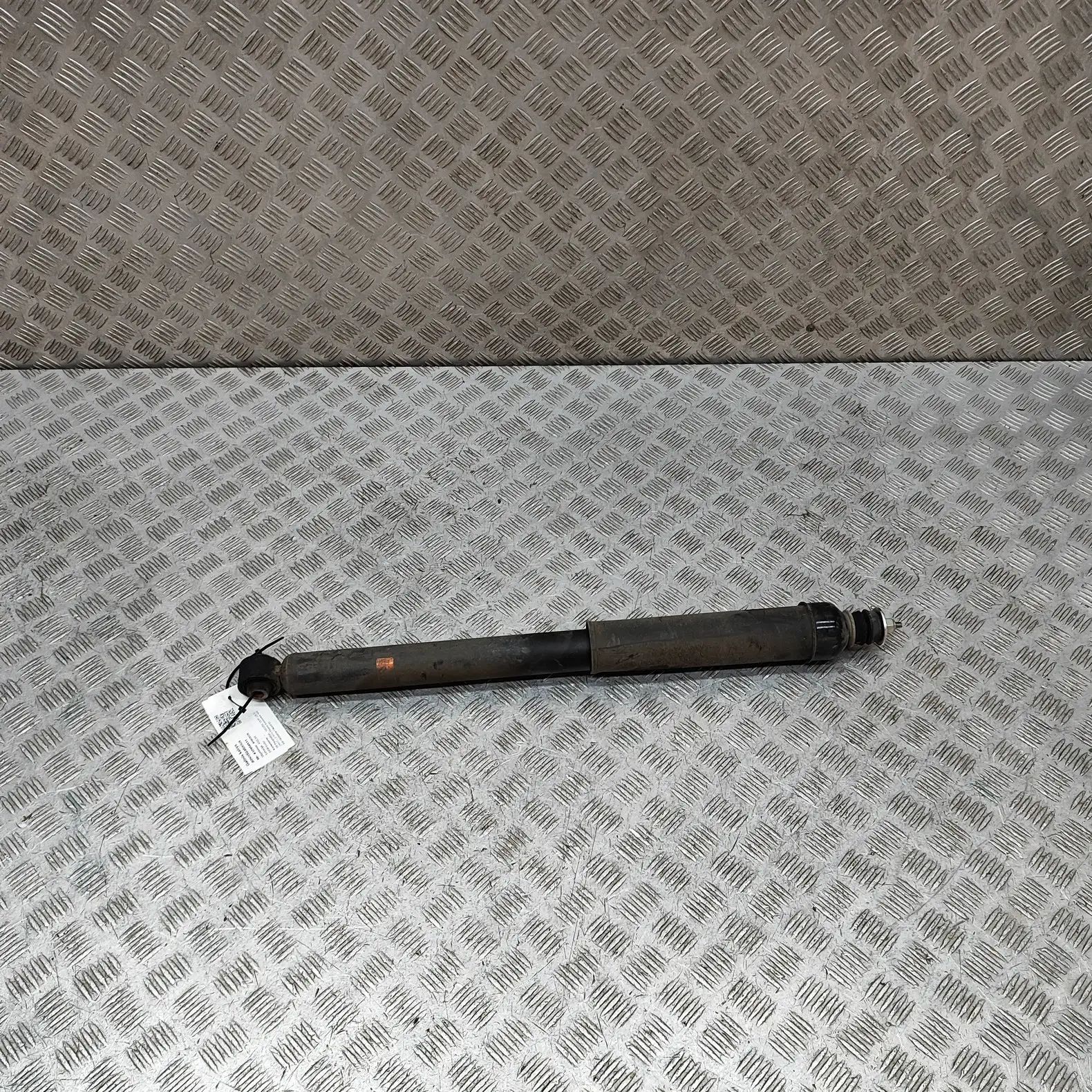 Nissan Leaf Shock absorber — rear left Shock absorber — rear left — NISSAN LEAF (ZE1) ...