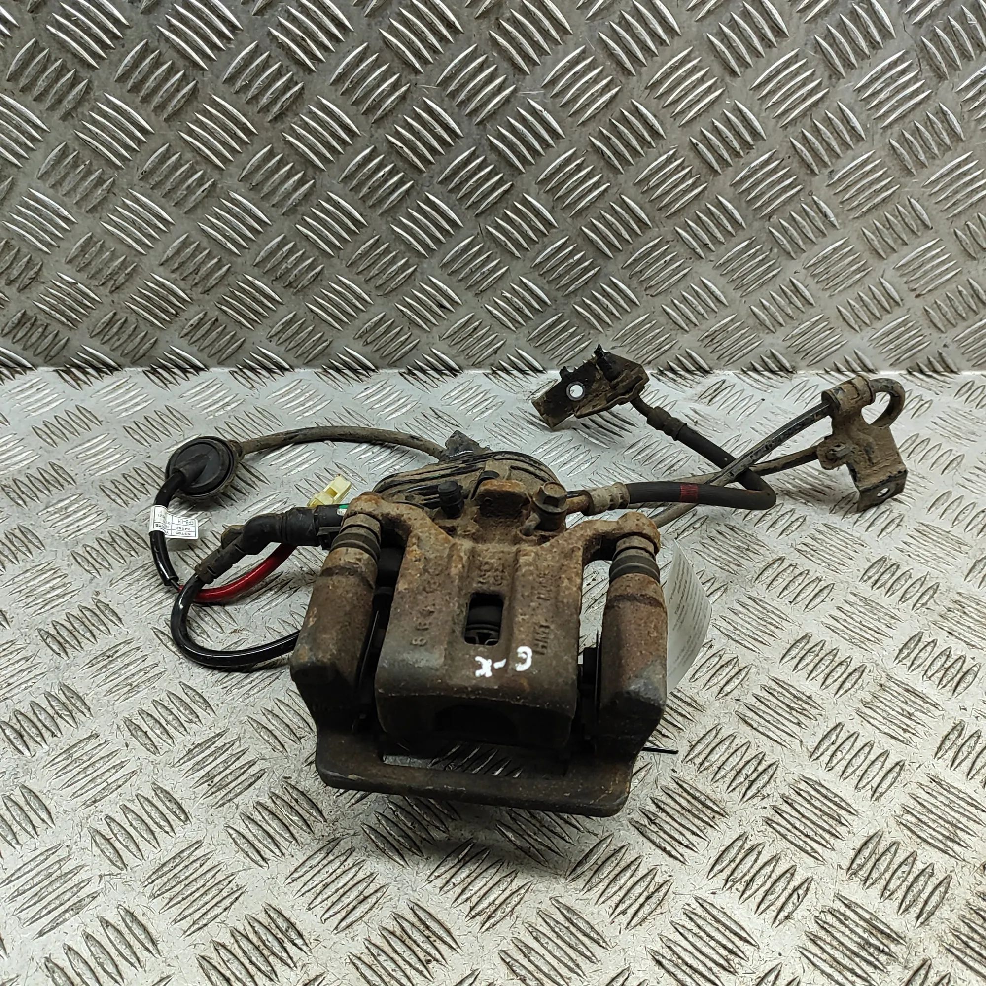 Kia Optima (JF) Brake caliper — rear left