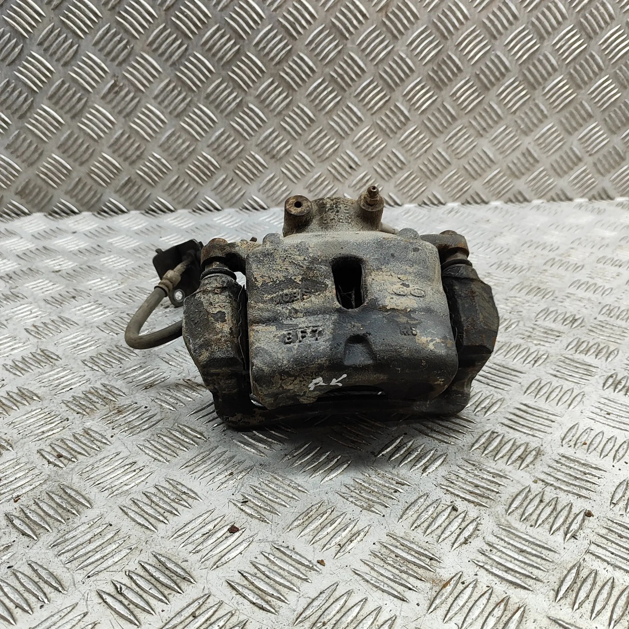 Kia Optima (JF) Brake caliper — front left