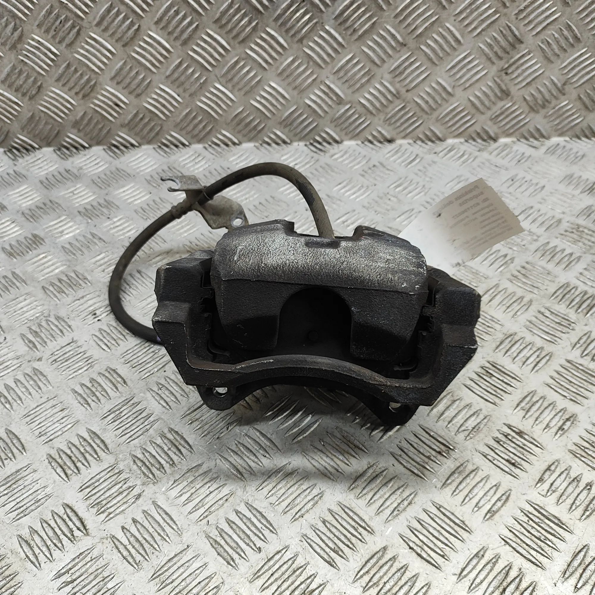 Kia Sportage Brake caliper — front right Brake caliper — front right — KIA SPORTAGE (V N...