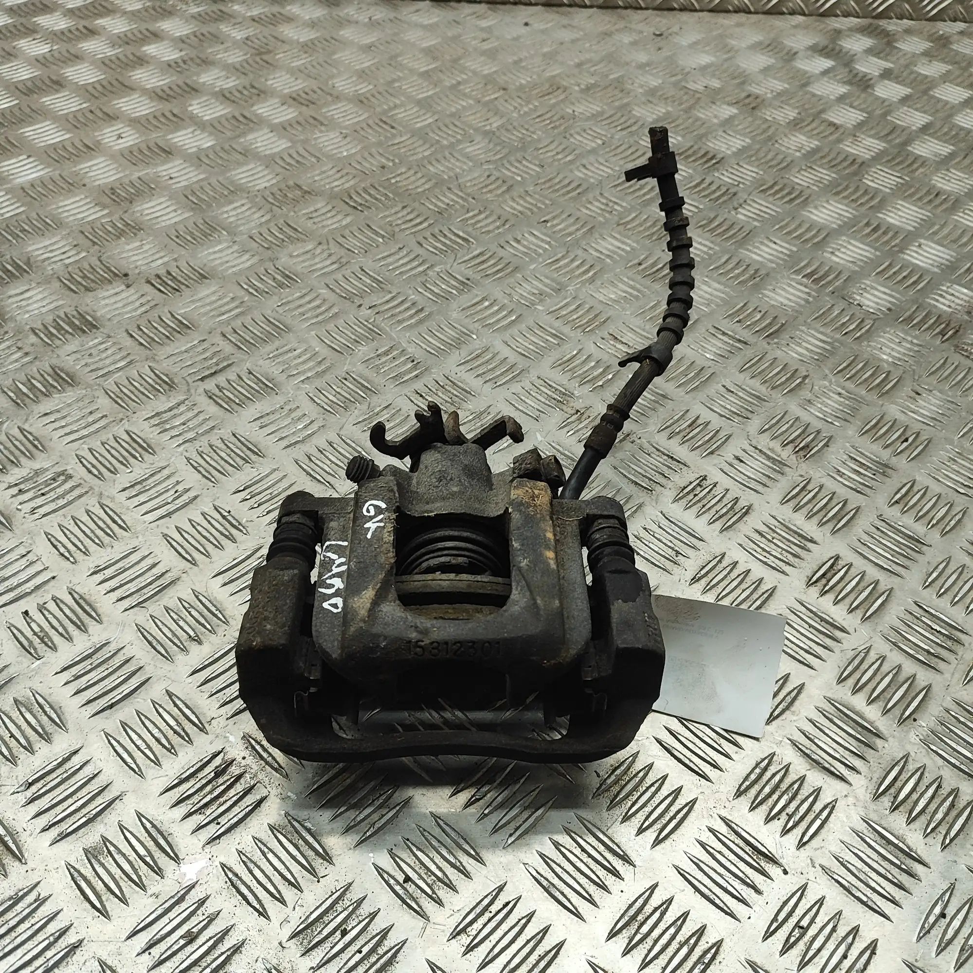 Chrysler Grand Voyager / Town & Country Brake caliper — rear left Brake caliper — rear left — CHRYSLER GRAND (VOY...