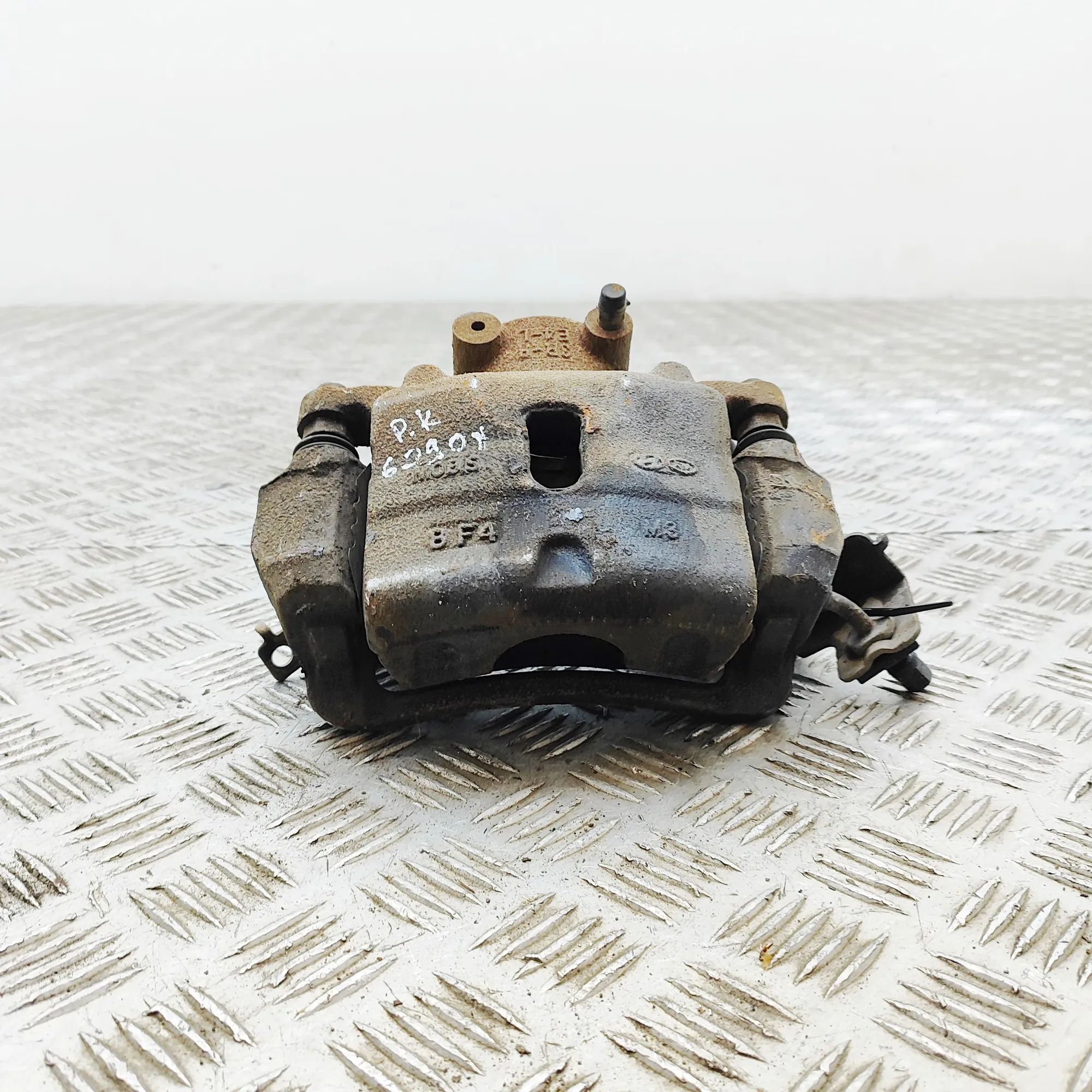 Kia Optima (JF) Brake caliper — front left
