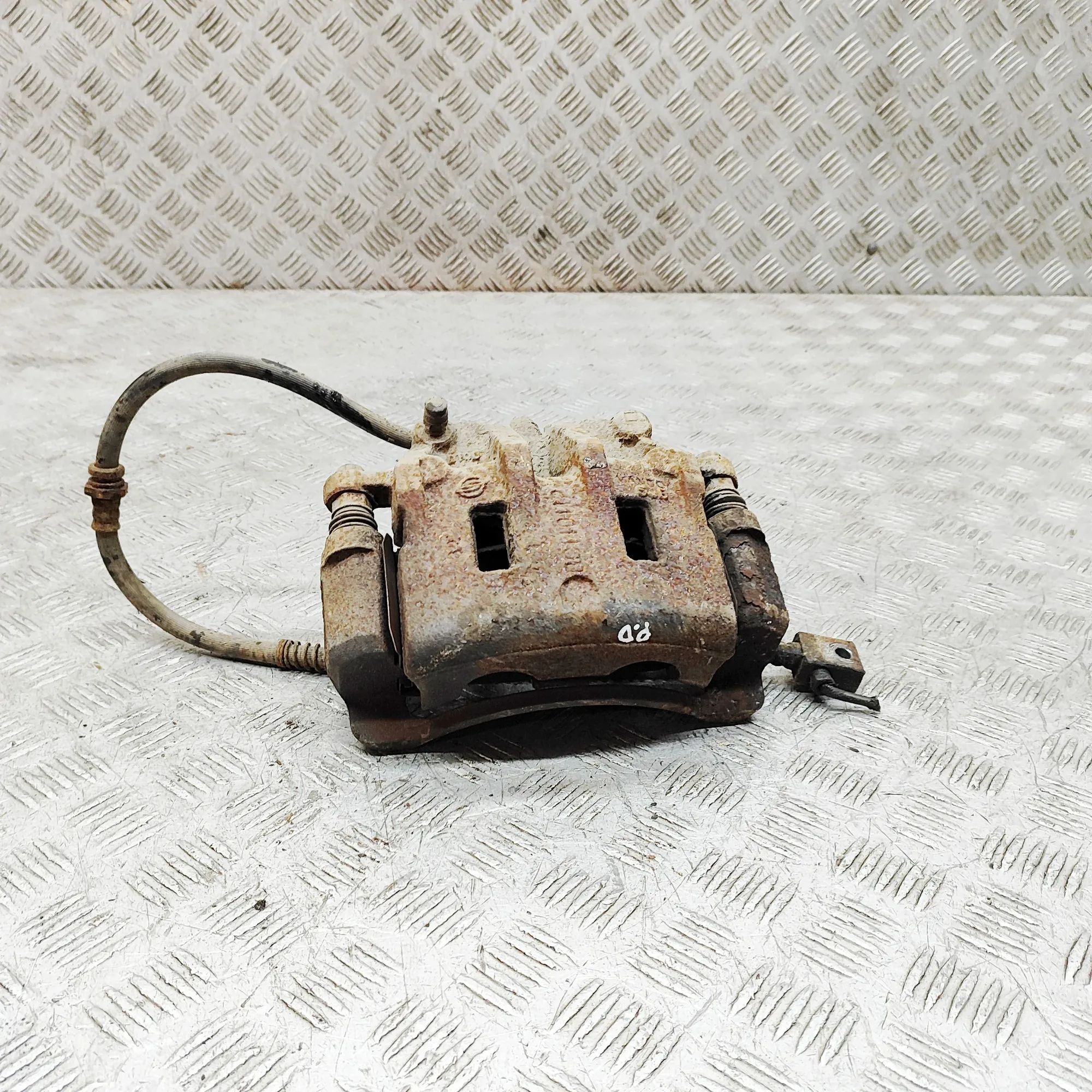 Ssangyong Rexton Brake caliper — front right Brake caliper — front right — SSANGYONG REXTON ...