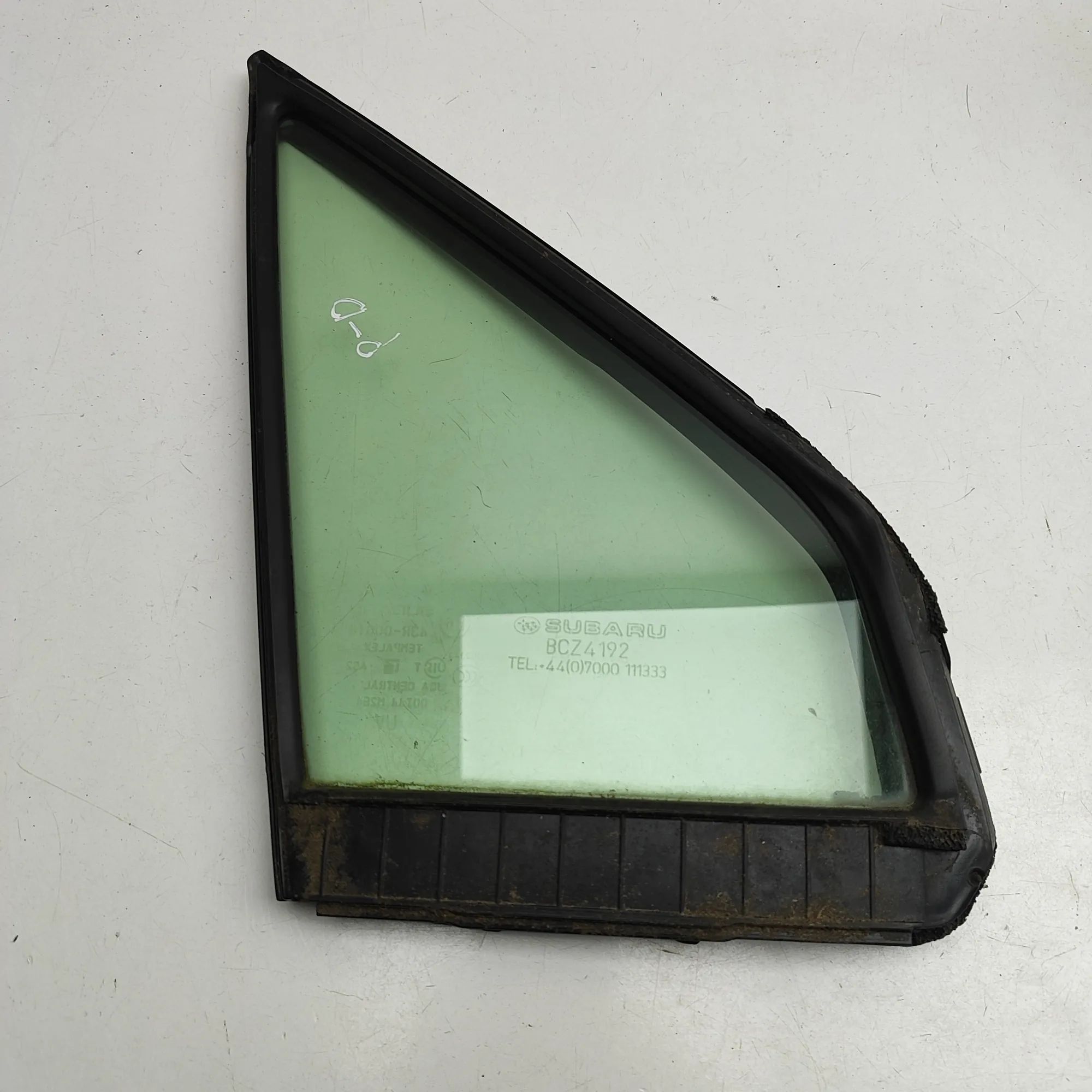 Subaru Forester Door quarter window — front right Door quarter window — front right — SUBARU FORE...