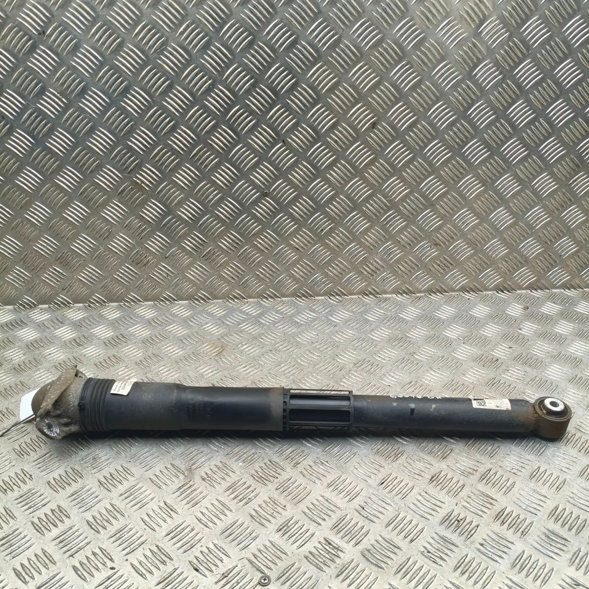 Skoda Octavia Shock absorber — rear left Shock absorber — rear left — SKODA OCTAVIA (IV ...