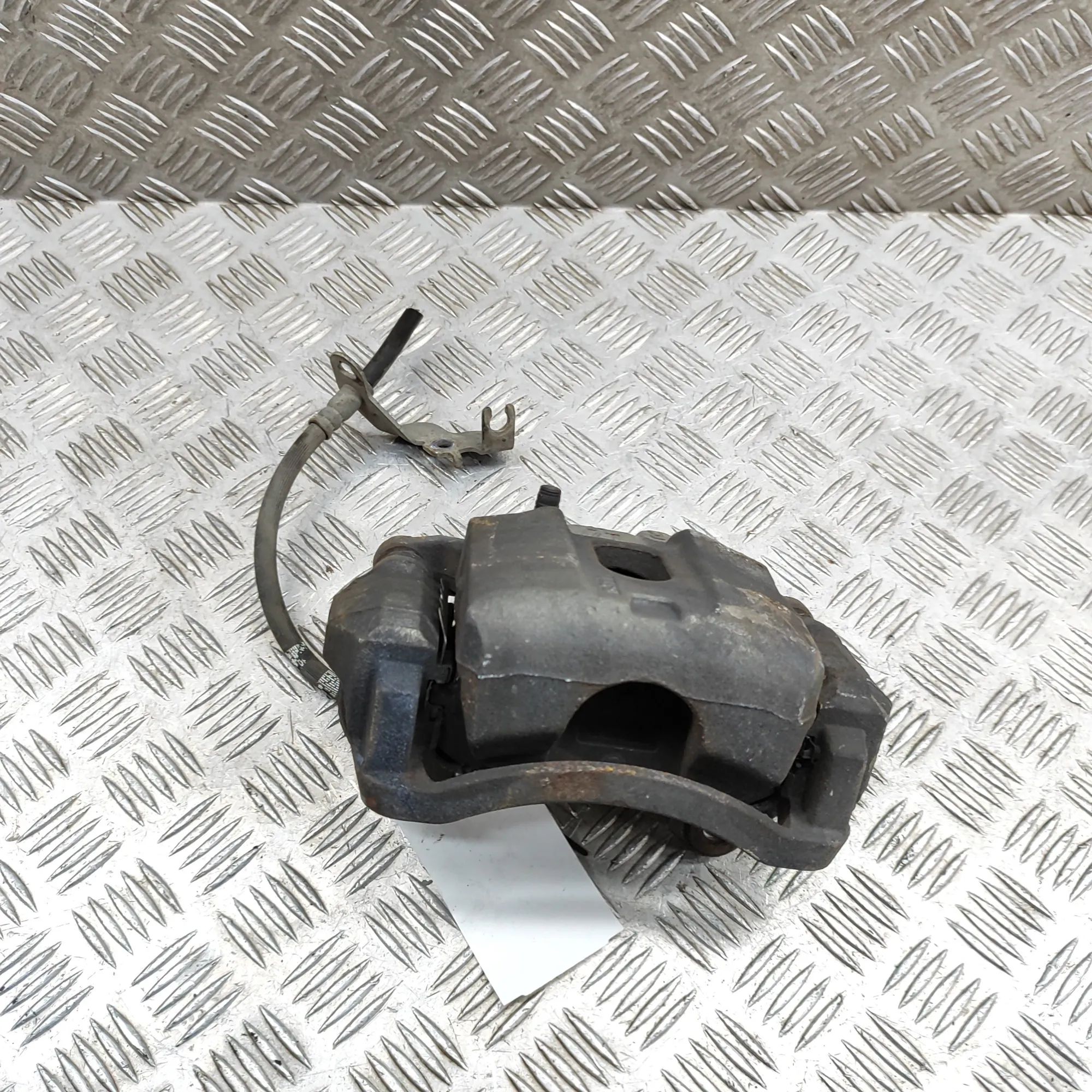 Kia Sportage Brake caliper — front left Brake caliper — front left — KIA SPORTAGE (QL) ...