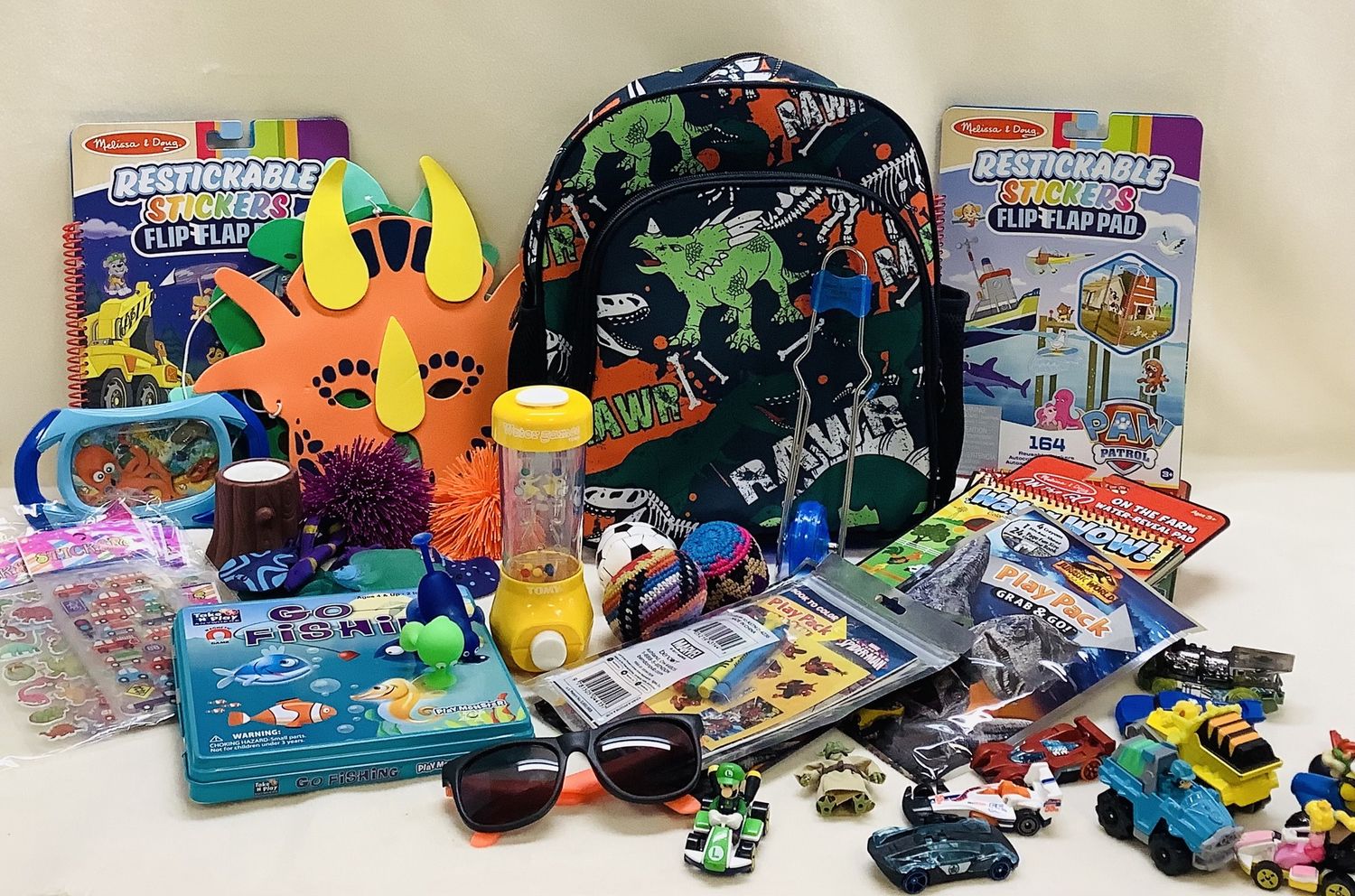 Dinosaur Themed Fun on the Go Backpack Filled with Games, Toys &amp; Treasures (Ages 4+) - RS4915