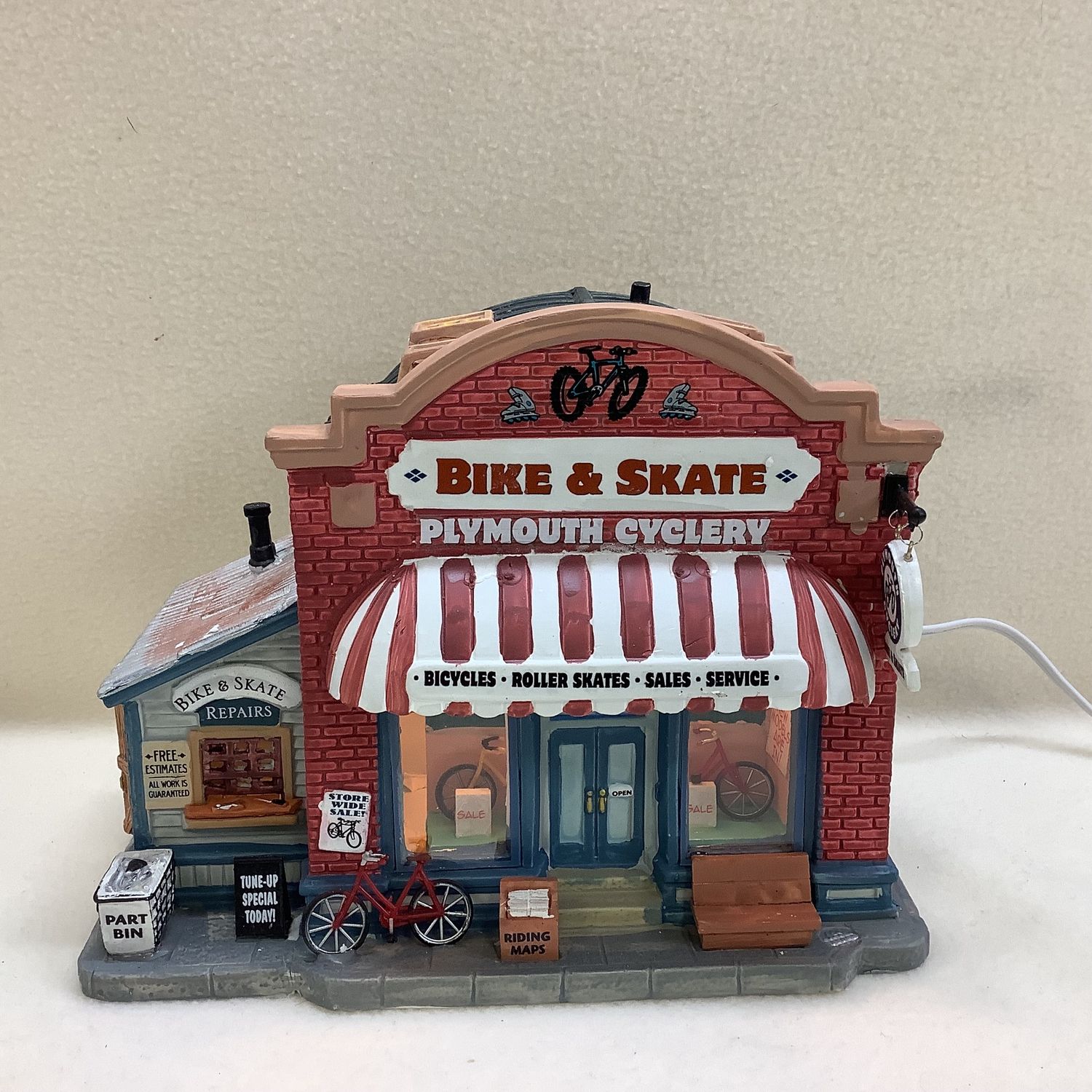 Lemax Village Collection Plymouth Cyclery #95811 - RS5211