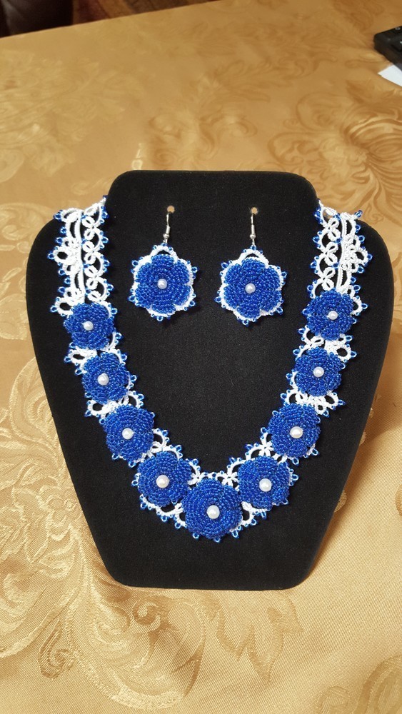 Set of necklace and earrings.White lace with blue seed-beads