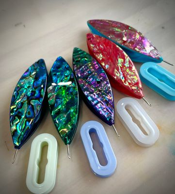 Dreamlit shuttles decorated with Abalone and Shell veneer