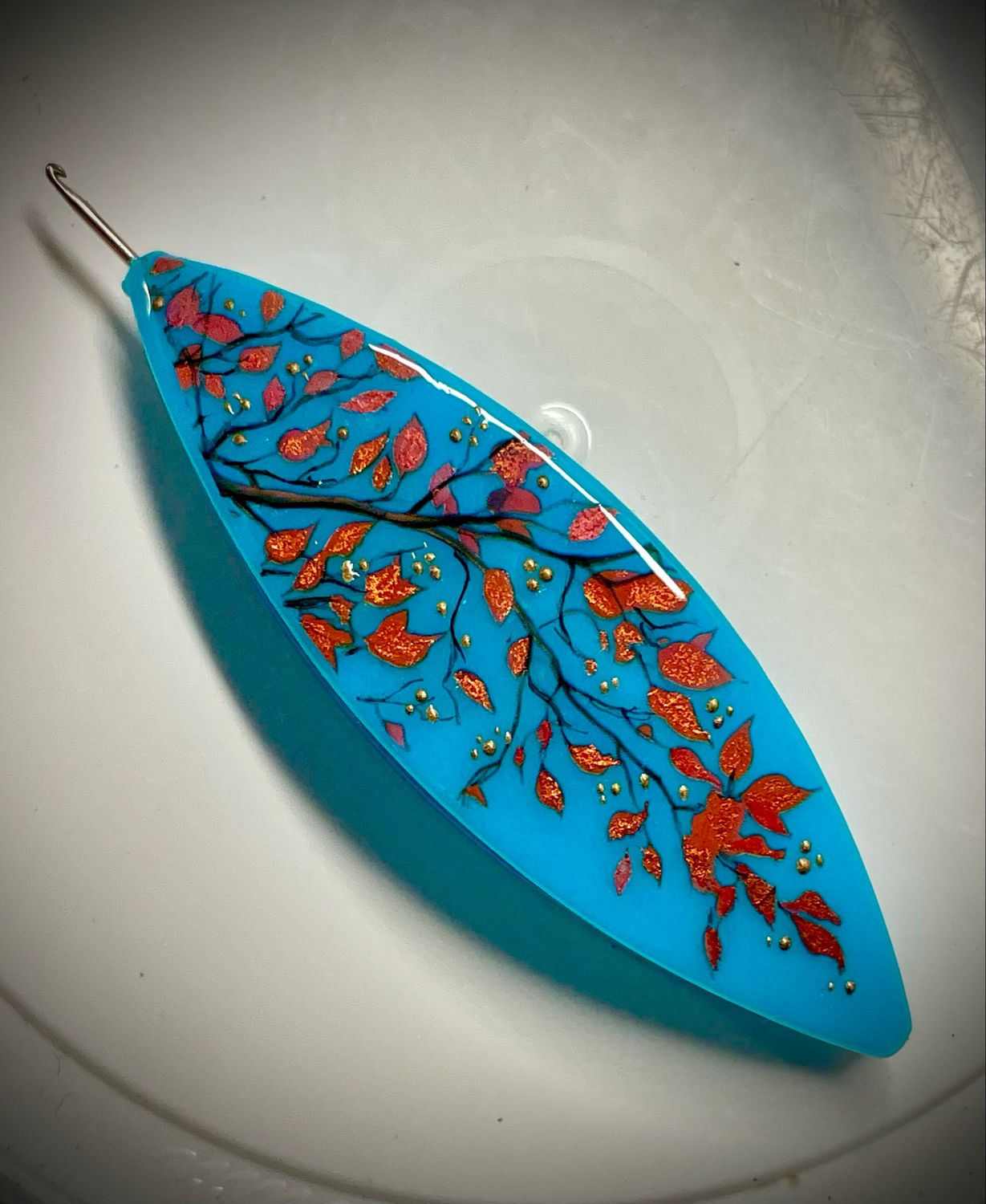 Moonlit shuttle decorated on one side, “Sky-fire Branches”