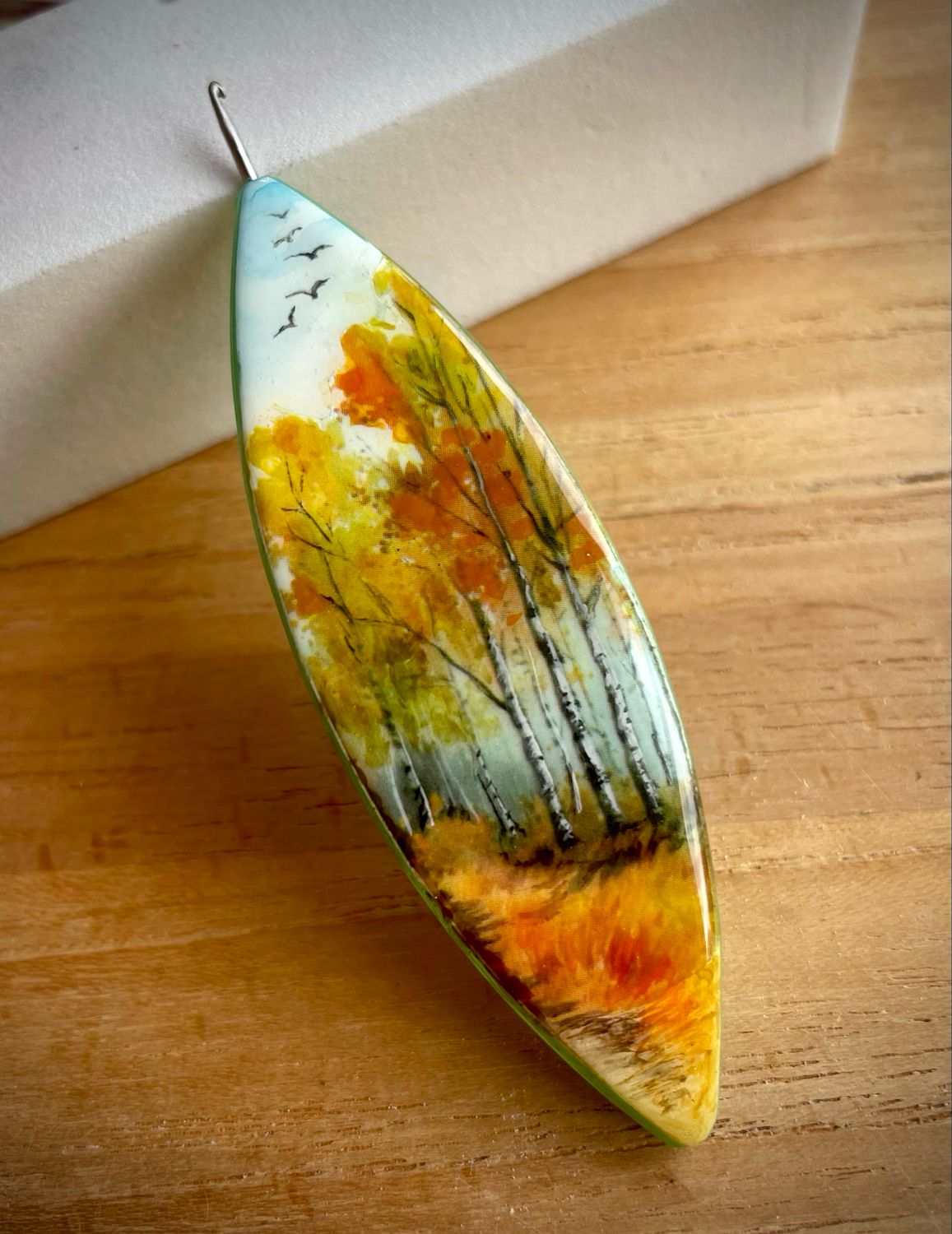 Moonlit shuttle decorated on one side, “Autumn Melodies”
