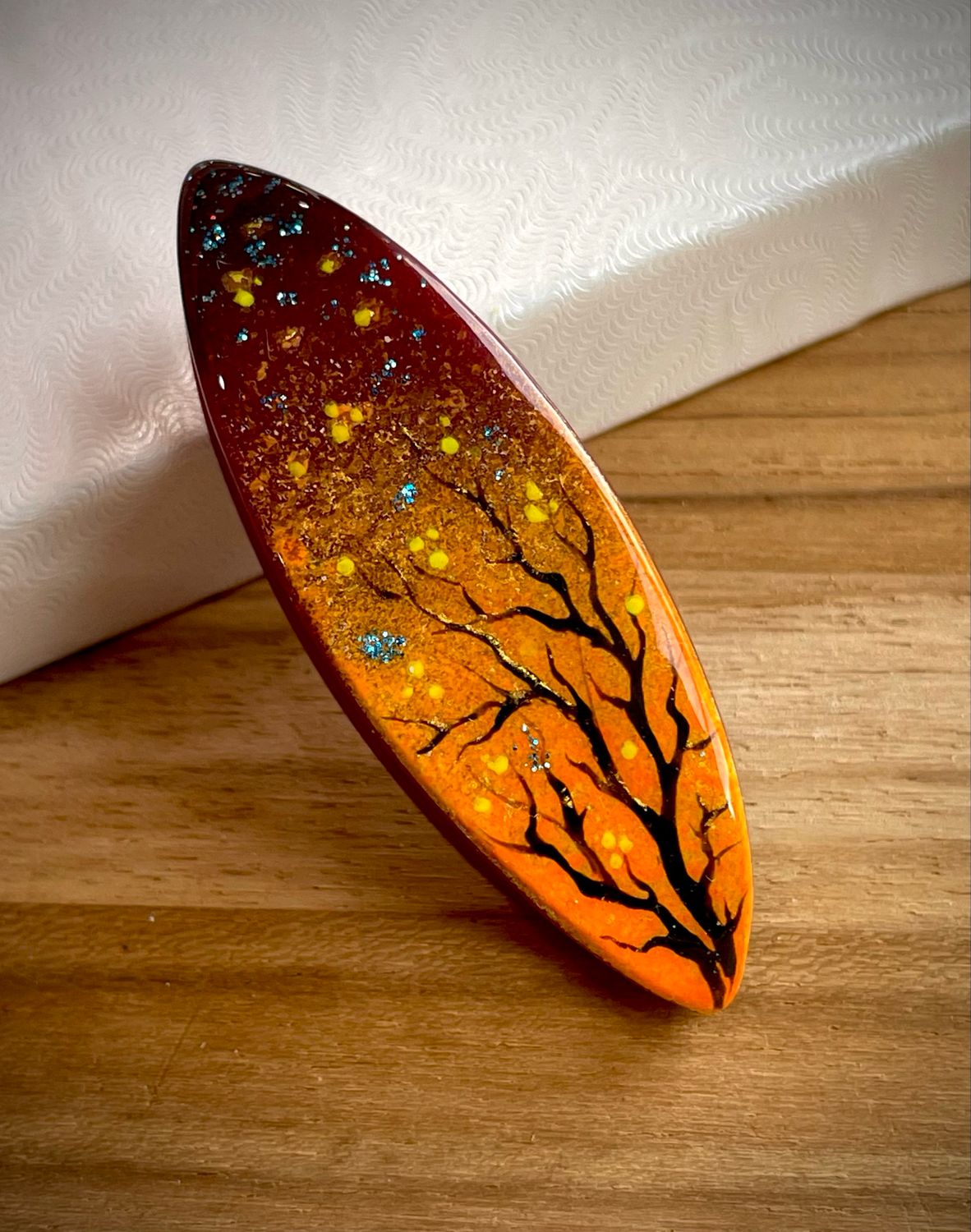 Handmade acrylic shuttle decorated on one side, “Under the Amber Stars&quot;-1