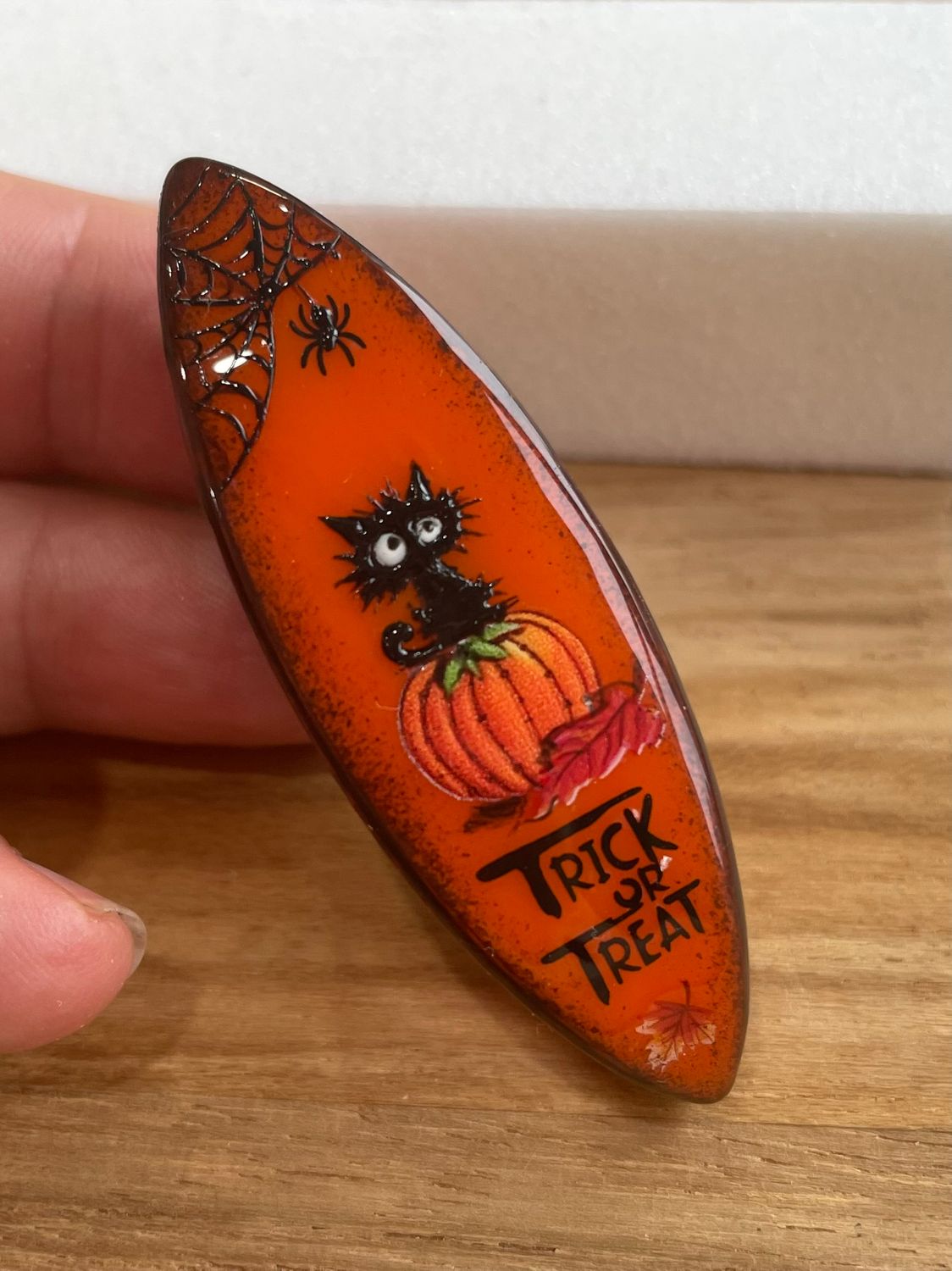 Handmade acrylic shuttle decorated on one side, Tiny Terror of the Pumpkins